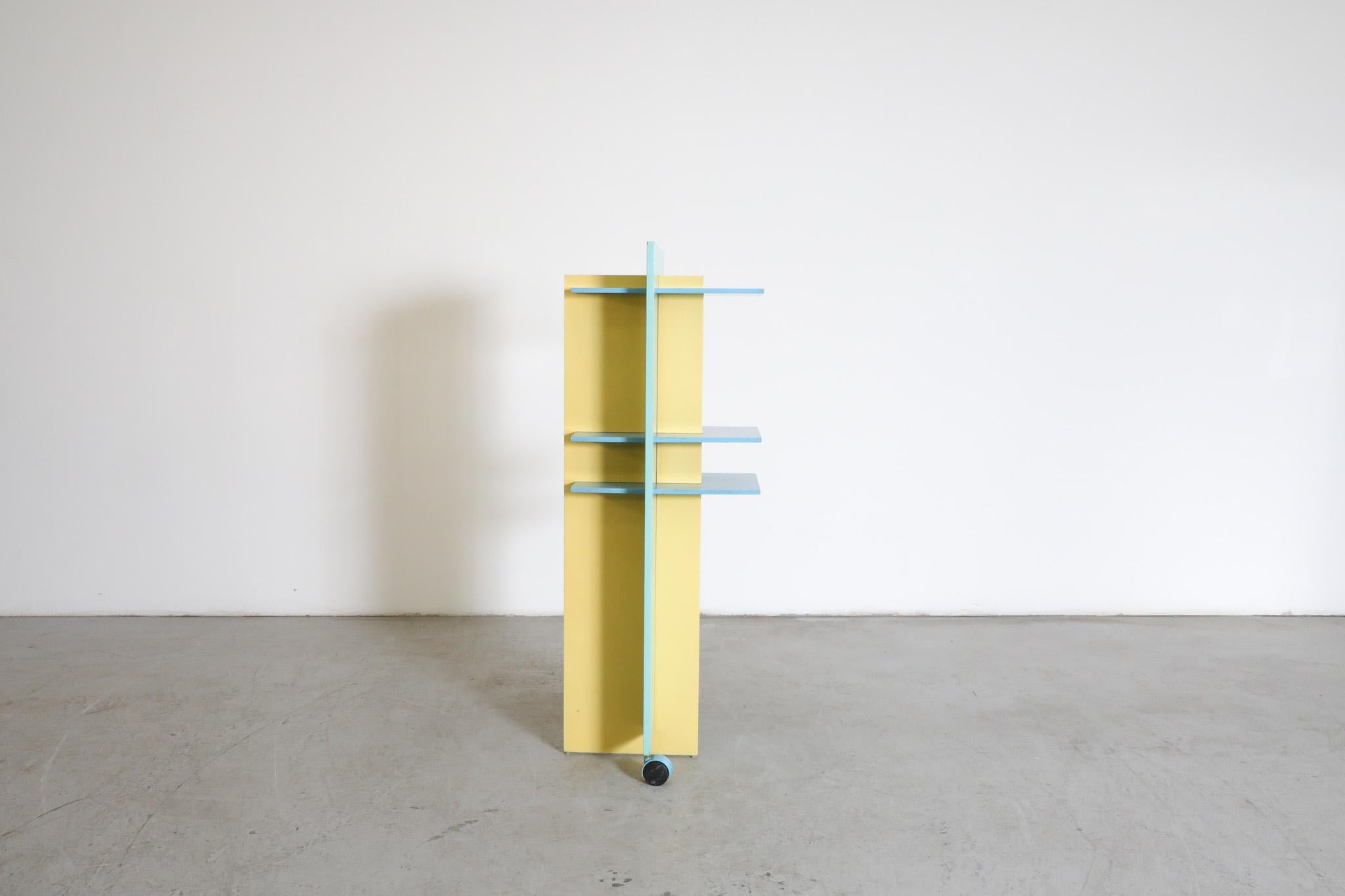 Wood Memphis Claudio Salocchi Inspired Blue & Yellow Revolving Bookcase For Sale