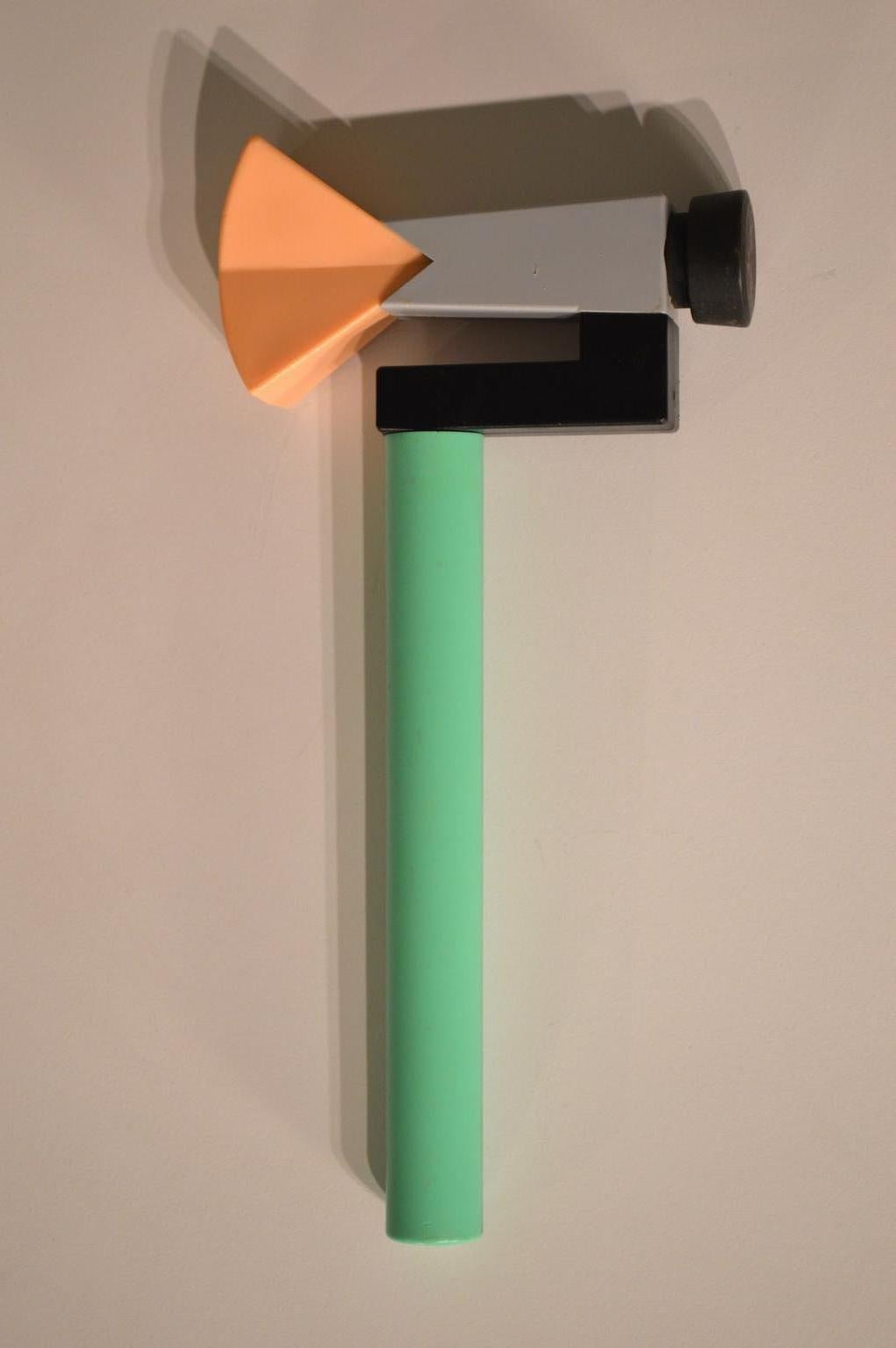 A rare Memphis-inspired design, part of a tool kit made by Koyo Sangyo of Japan, circa 1980's. Although functional, this hammer makes a unique design accent. 

Playful colors and an unusual C-shaped form, made primarily of molded plastic, the weight