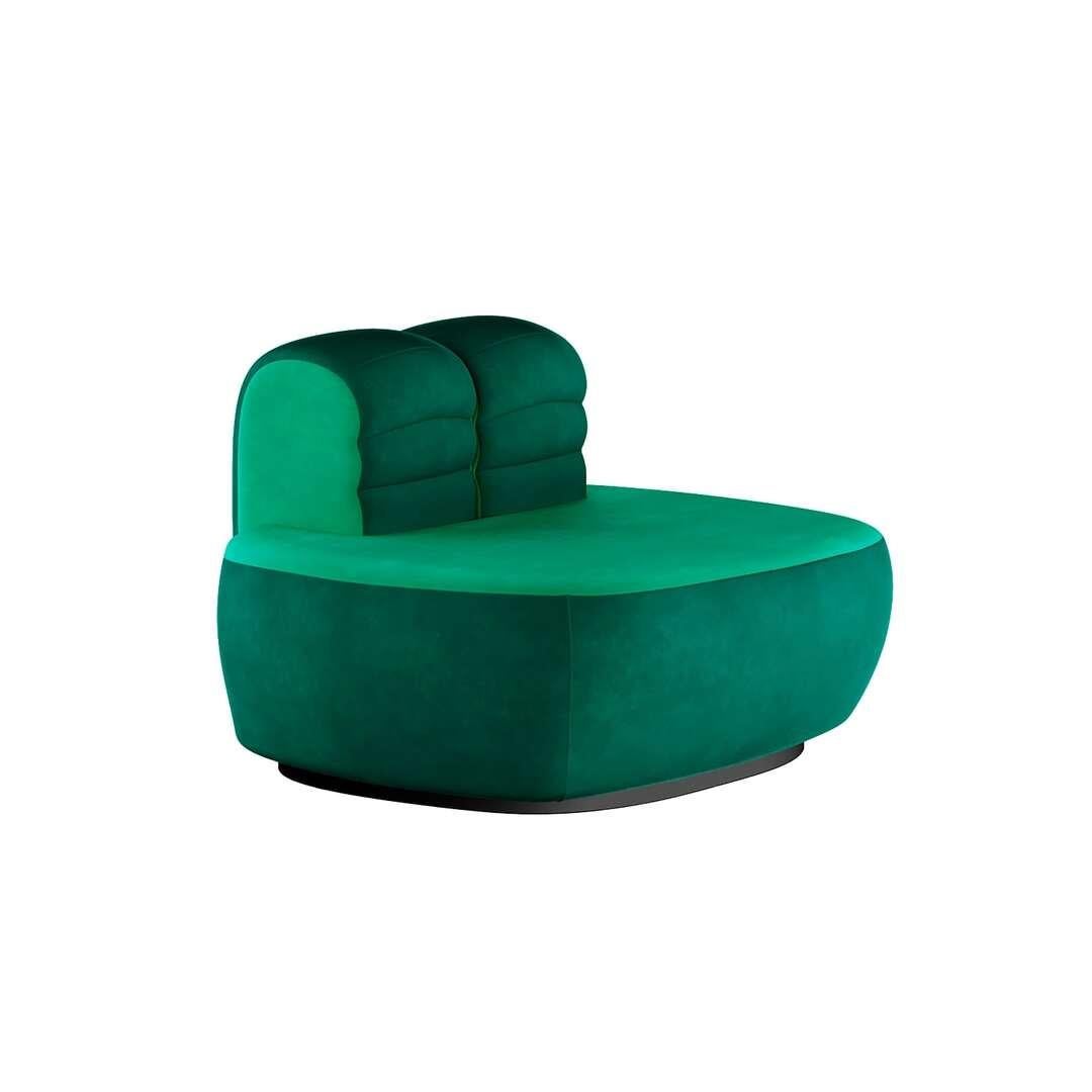 Memphis Design Style Plumy Armchair Upholstered in Green Velvet w Curved Shape
Vonkli Armchair II Green is a Memphis Design style plumy armchair with a large seat and a small backrest. This chunky armchair, upholstered in green velvet, has a