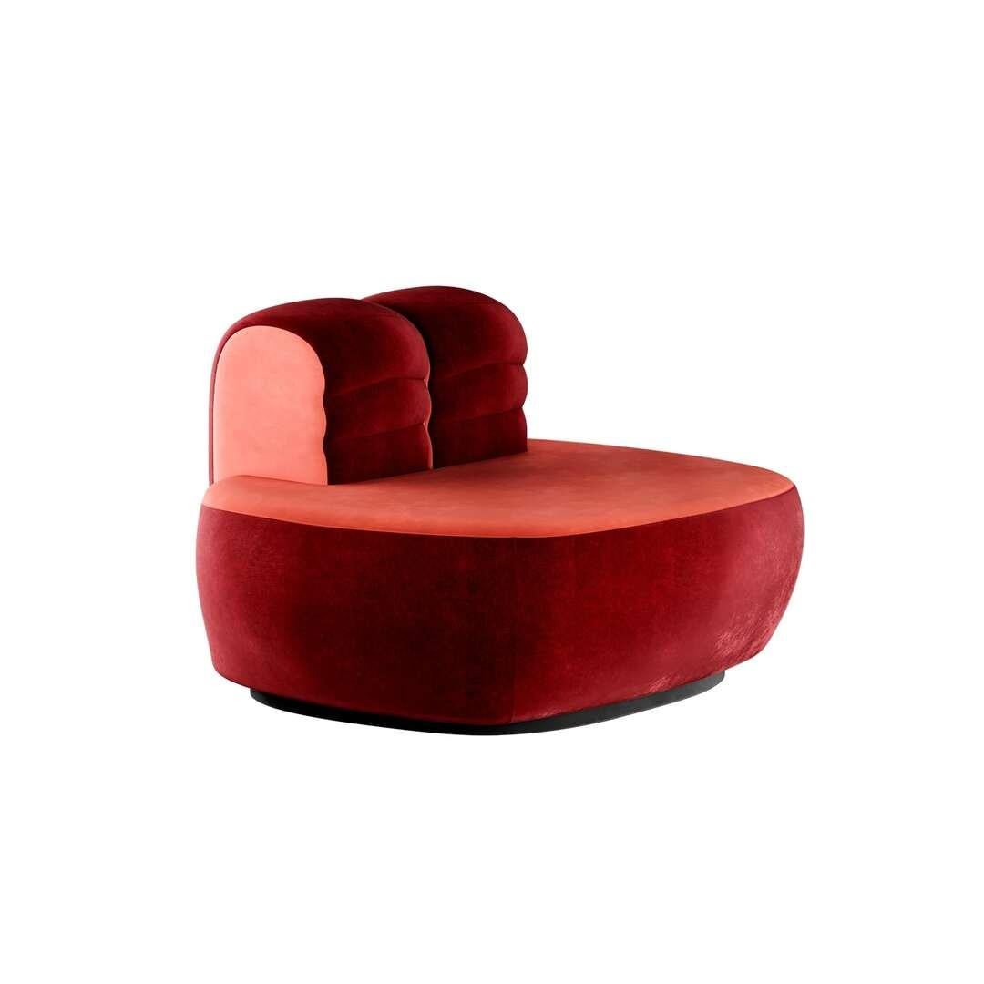 Memphis Design Style Plumy Armchair Upholstered in Red Velvet w Curved Shape
Vonkli Armchair II Red is a Memphis Design style plumy armchair with a large seat and a small backrest. This chunky armchair, upholstered in red velvet, has a voluptuous