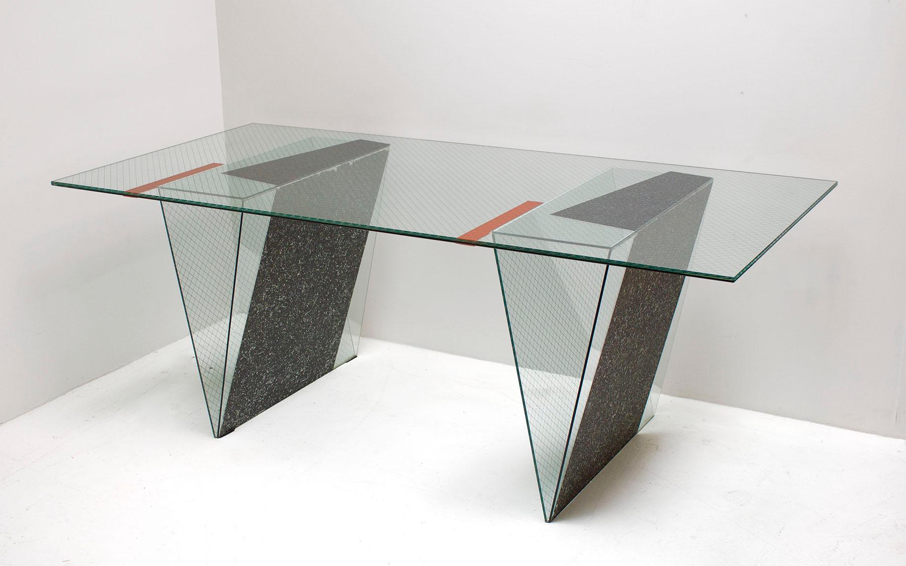 This rare glass executive desk was designed by world famous architect Robert Mangurian and is a one-of-a-kind - never put into production design. It was the personal desk of Lorry Parks Dudley, who was the founder of the Ettore Sottsass-designed