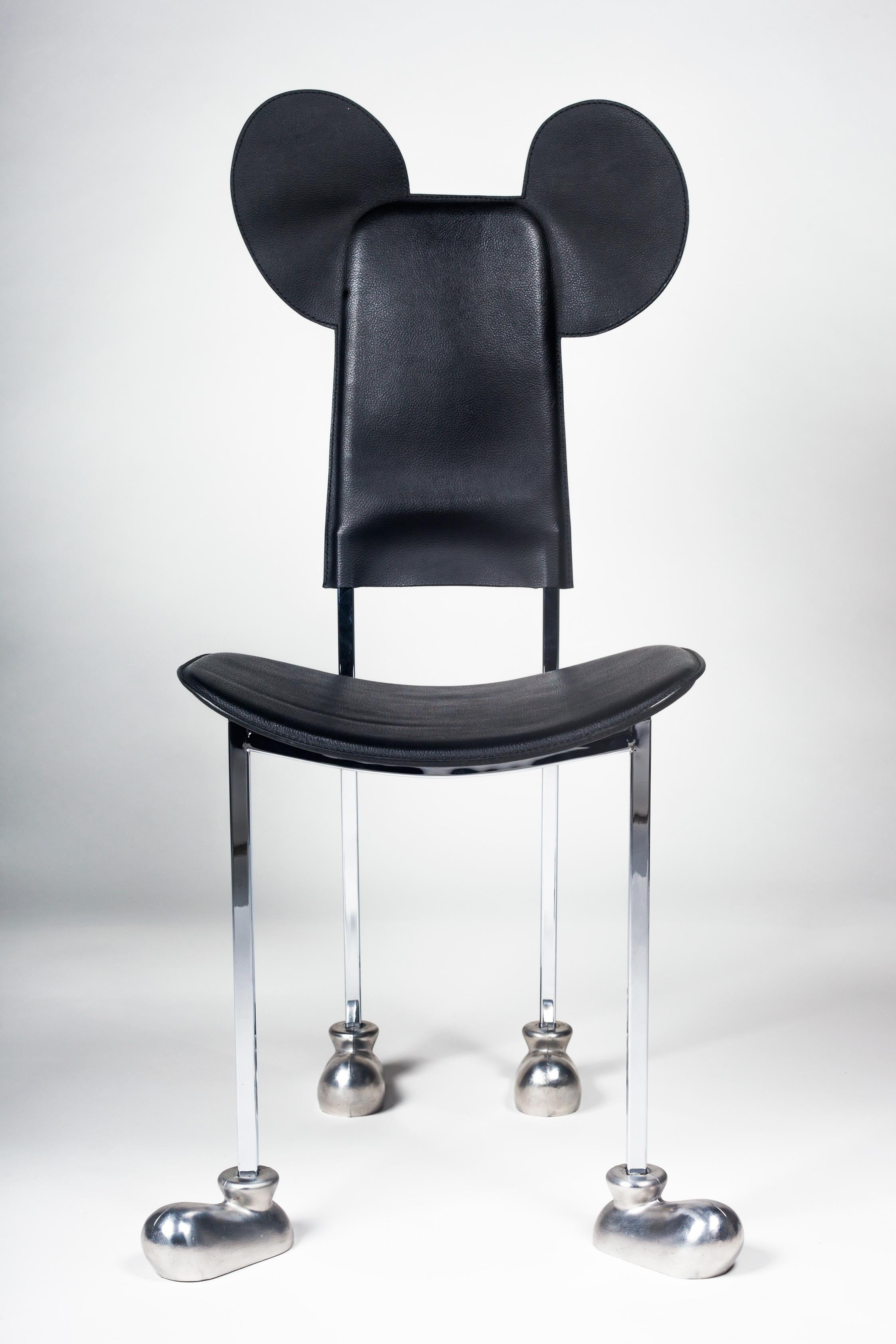 The Garriris chair, commonly called the Mickey chair, is an iconic postmodern design that Javier Mariscal made for his own brand, Akaba, in 1987. 

YEAR: 1987
COUNTRY: Spain
DIMENSIONS: H 38 in. x W 20.5 in. x D 21.5 in.
H 96.52 cm x W 52.07 cm