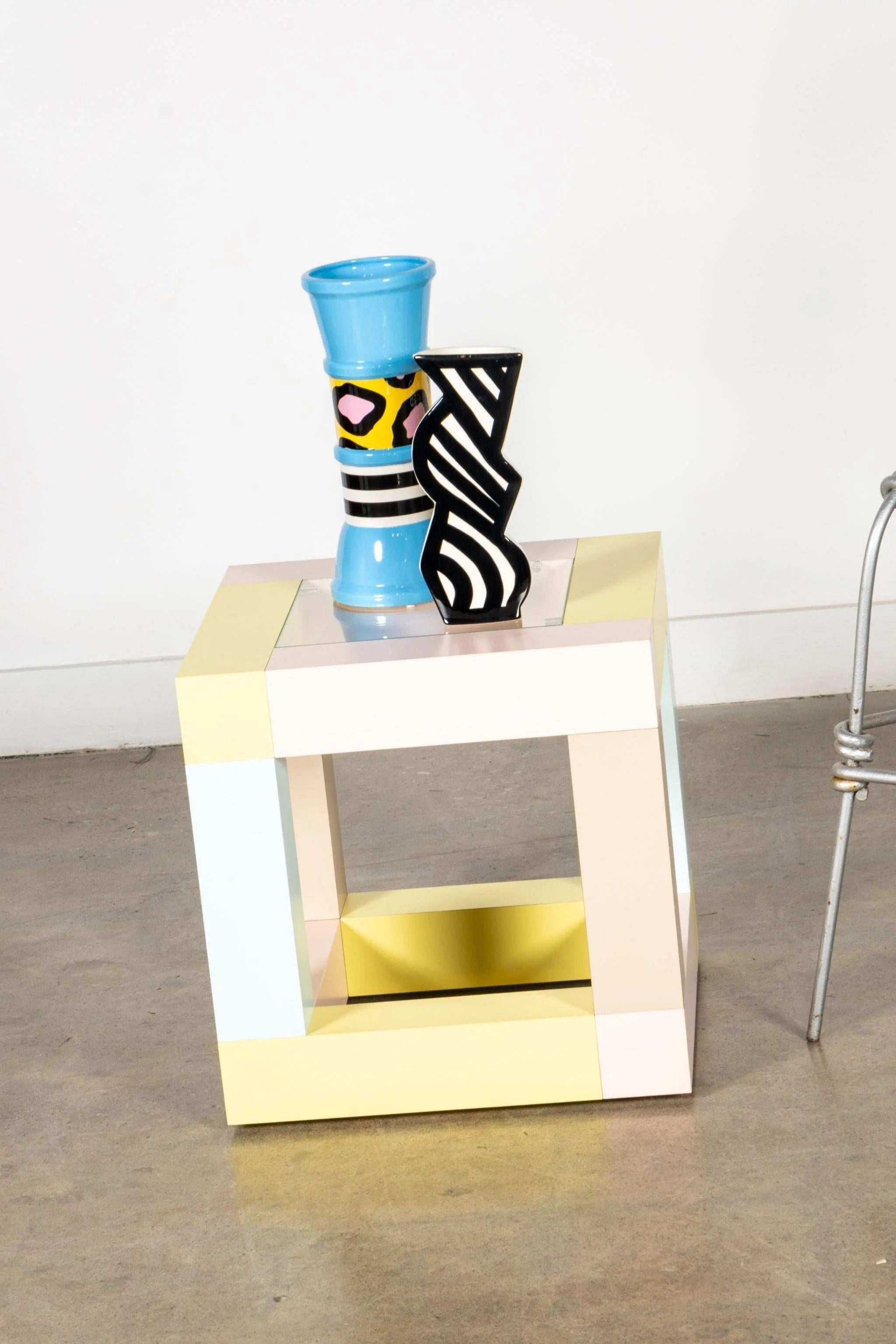 With its elementary shapes and delicate pastel colours, Mimosa by Ettore Sottsass seems to have come out of the world of childhood or dreams. This work asks us to free our imagination. The delicate pastel colour of Mimosa, a coffee table that