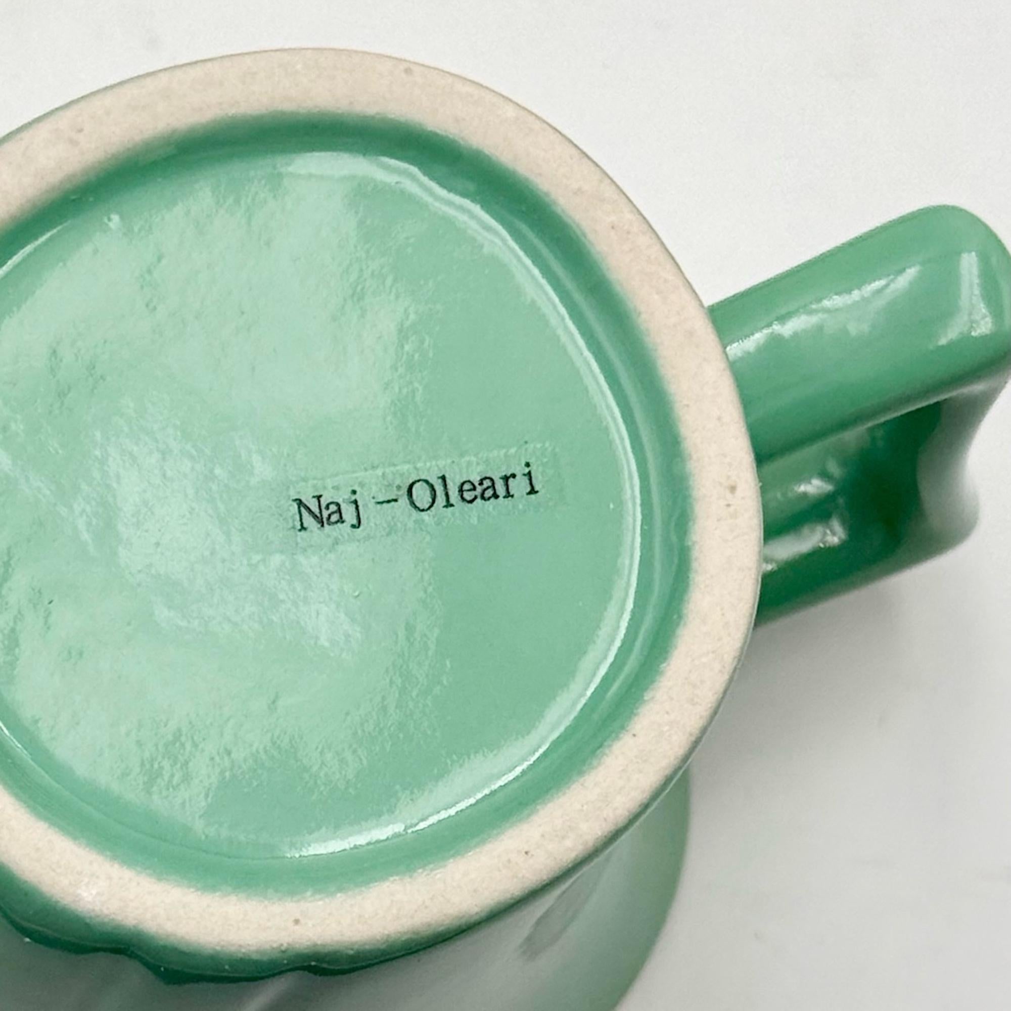 Experience the iconic style of the 80s design movement with this rare and amazing tea or coffee set designed by Massimo Iosa Ghini for Memphis Naj Oleari in the 1980s. This beautifully crafted ceramic set is a unique representation of the vibrant