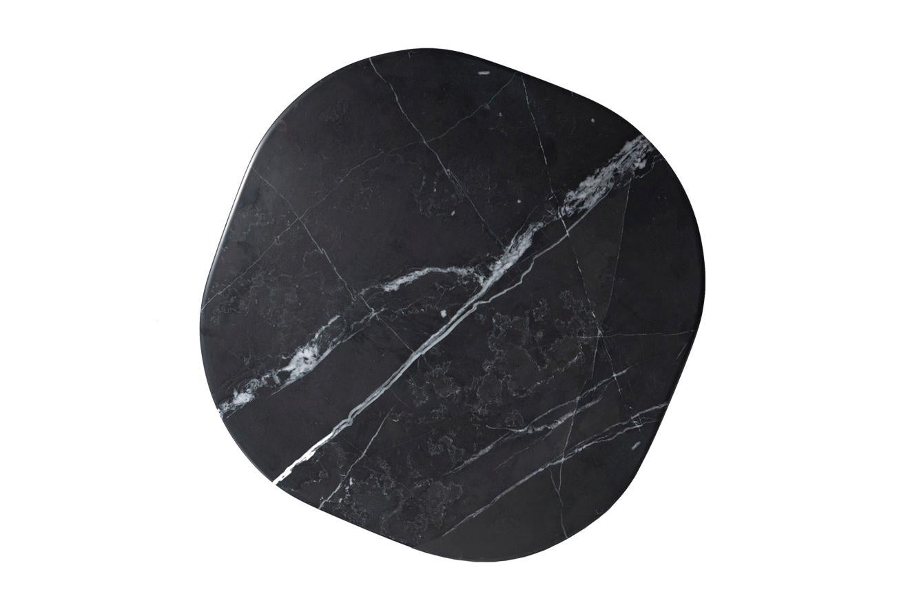 Memphis is a stunning collection of sleek, modern tables that boast a minimalistic and sophisticated aesthetic. Perfect for any family home, these tables feature a luxurious marble top in beautiful Black Calcutta and are available in a range of