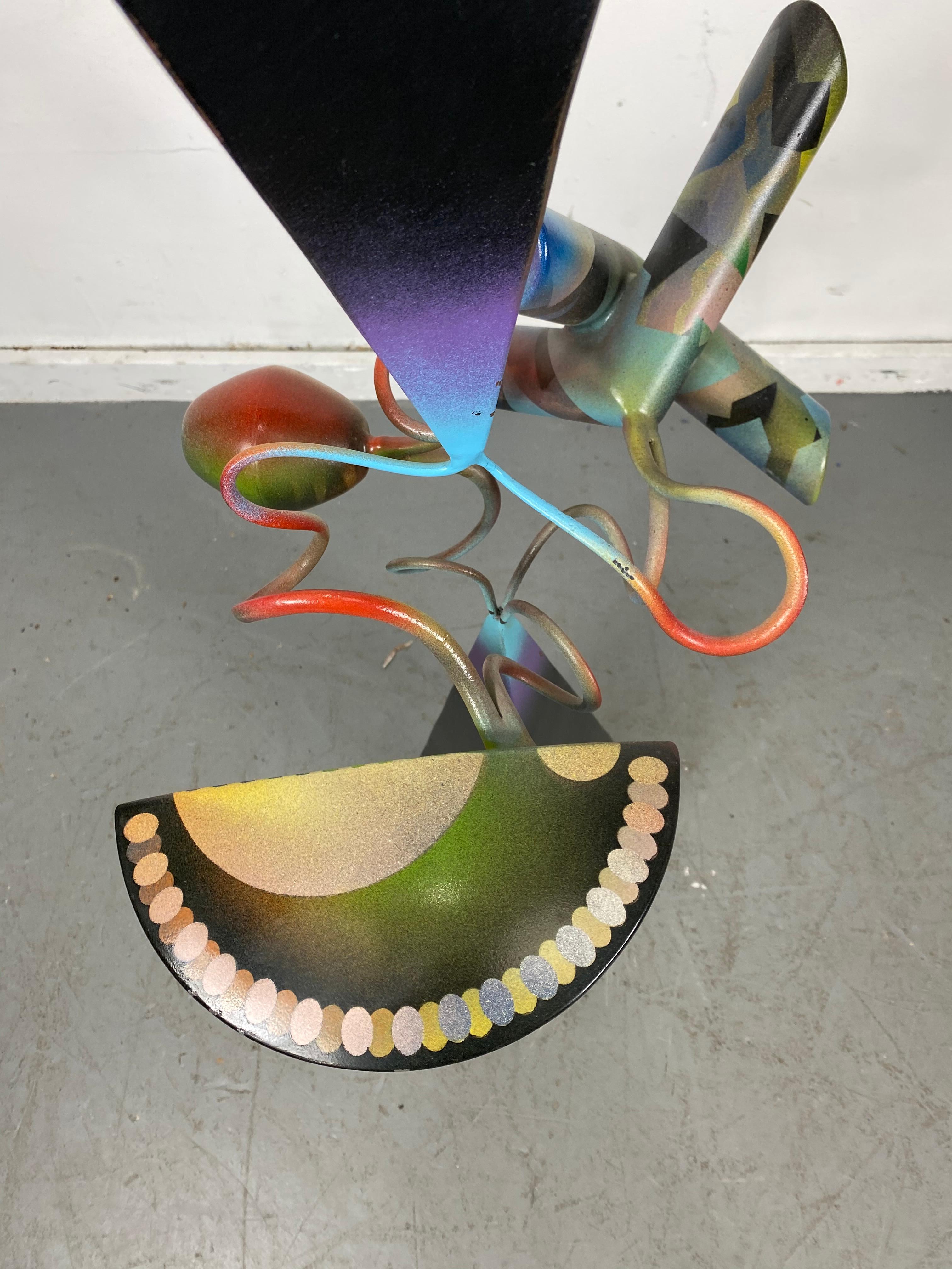 Memphis style abstract free-standing Welded steel sculpture by Jerry Dodd, his sculptural pieces are painted with enamels and are suitable for display indoors or protected areas outdoors,
About the artist:

Jerry Dodd lives and works in Commerce,