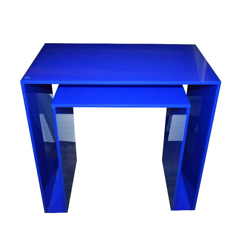 Memphis style acrylic desk in bright blue. A bright blue desk, credenza or console table for the Maximalist Memphis style lover. A superb piece created from bright blue acrylic. This beauty features open hollow legs on each side in bright blue. When