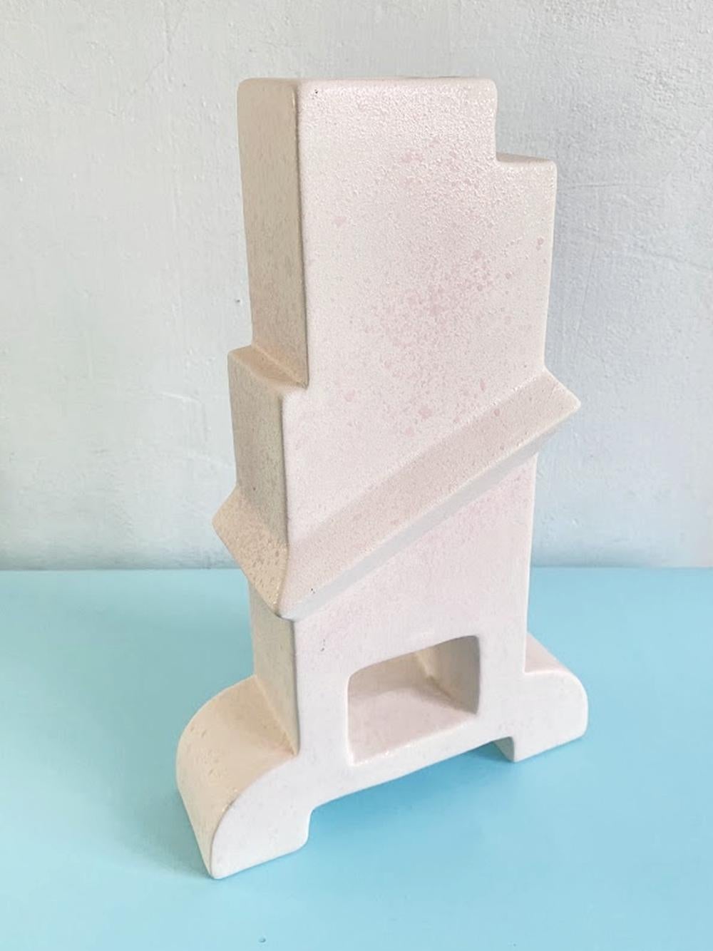 This unique Bastione model ceramic vase by Florio Keramia dates back to the 1990s. It represents a remarkable fusion of abstract forms and postmodern style, capturing attention in any space.

With its timeless design and refined artistic details, it