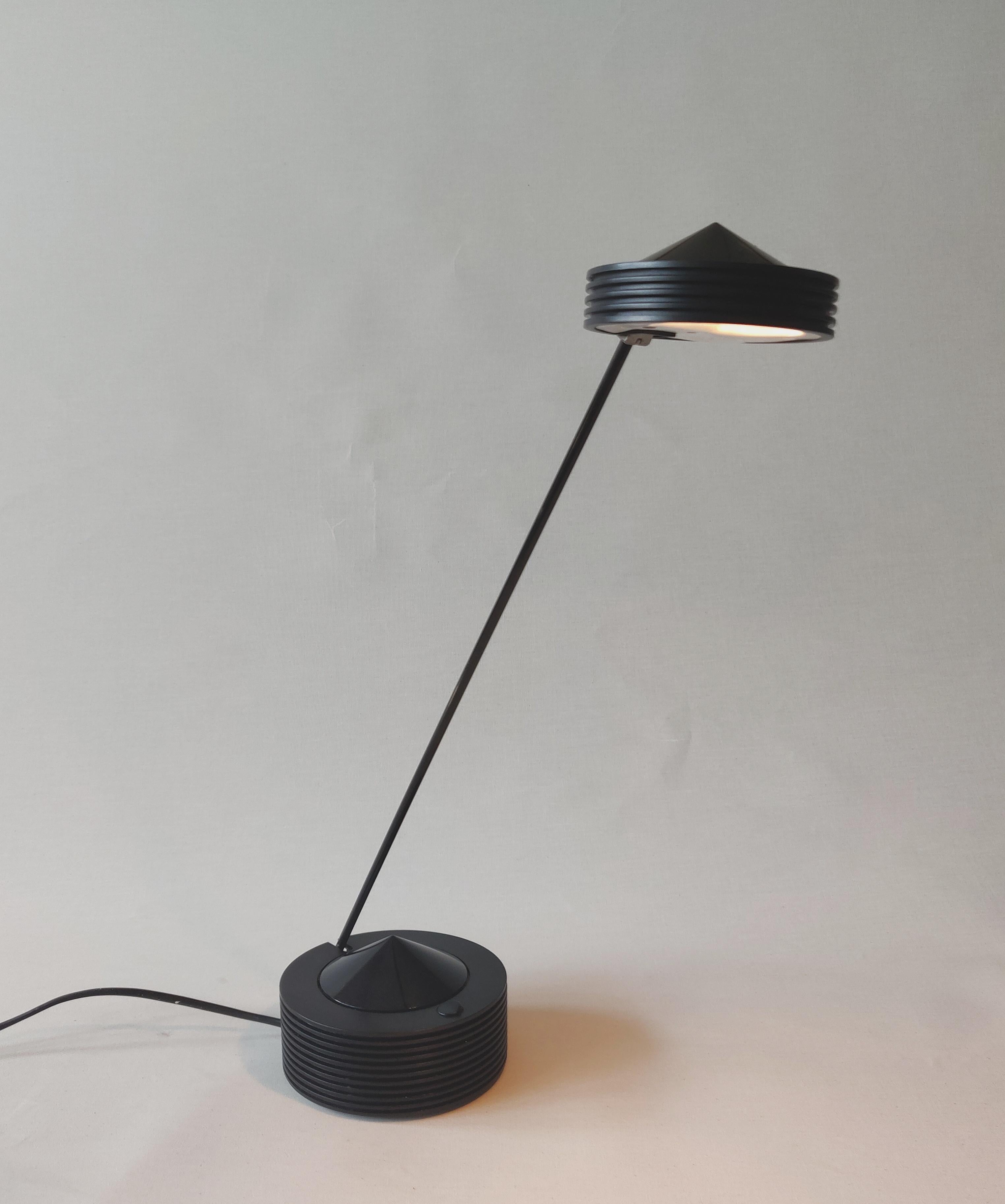 Dutch Design Memphis Group style desk lamp, 1980s 
Memphis Group style typically combines circles and triangles with black-and-white graphic patterns.

There are two of these lamps available.

AA#230555.