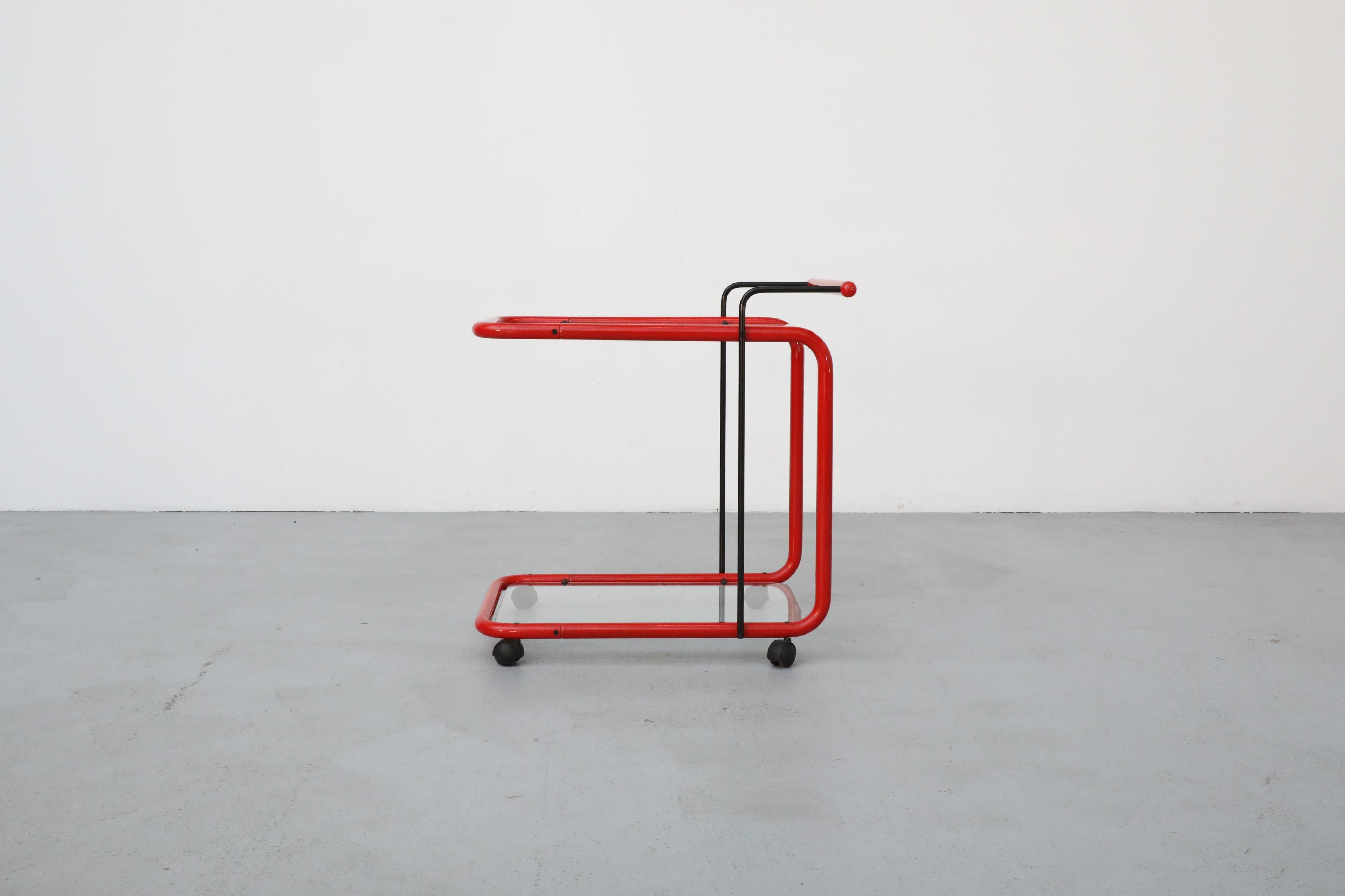 Dutch Memphis Style Post Modern Red Framed Two Tier Rolling Bar Cart with Grid Glass For Sale