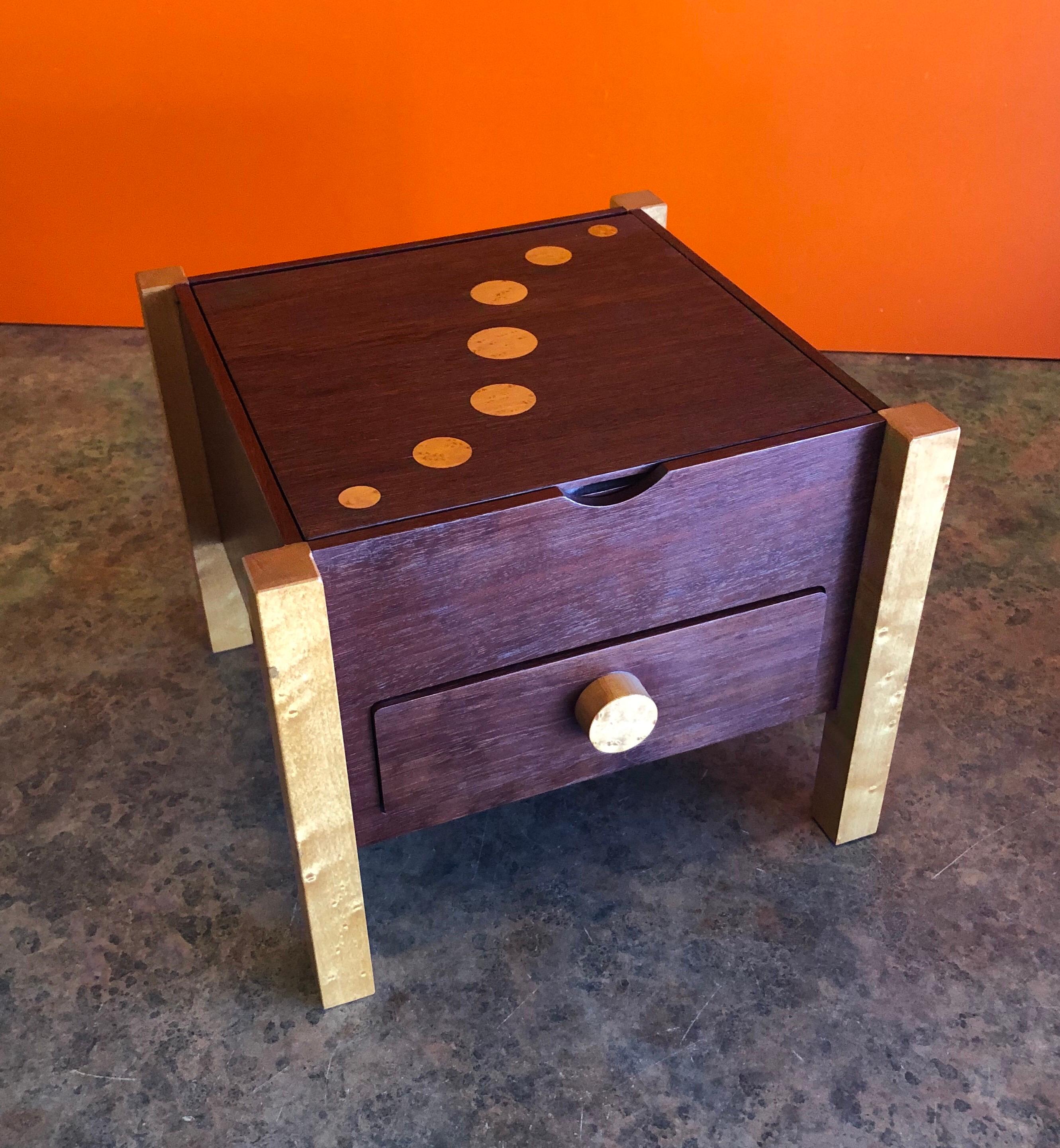 Memphis style Postmodern mixed wood jewelry box with drawer, circa 1998. The box measures: 9