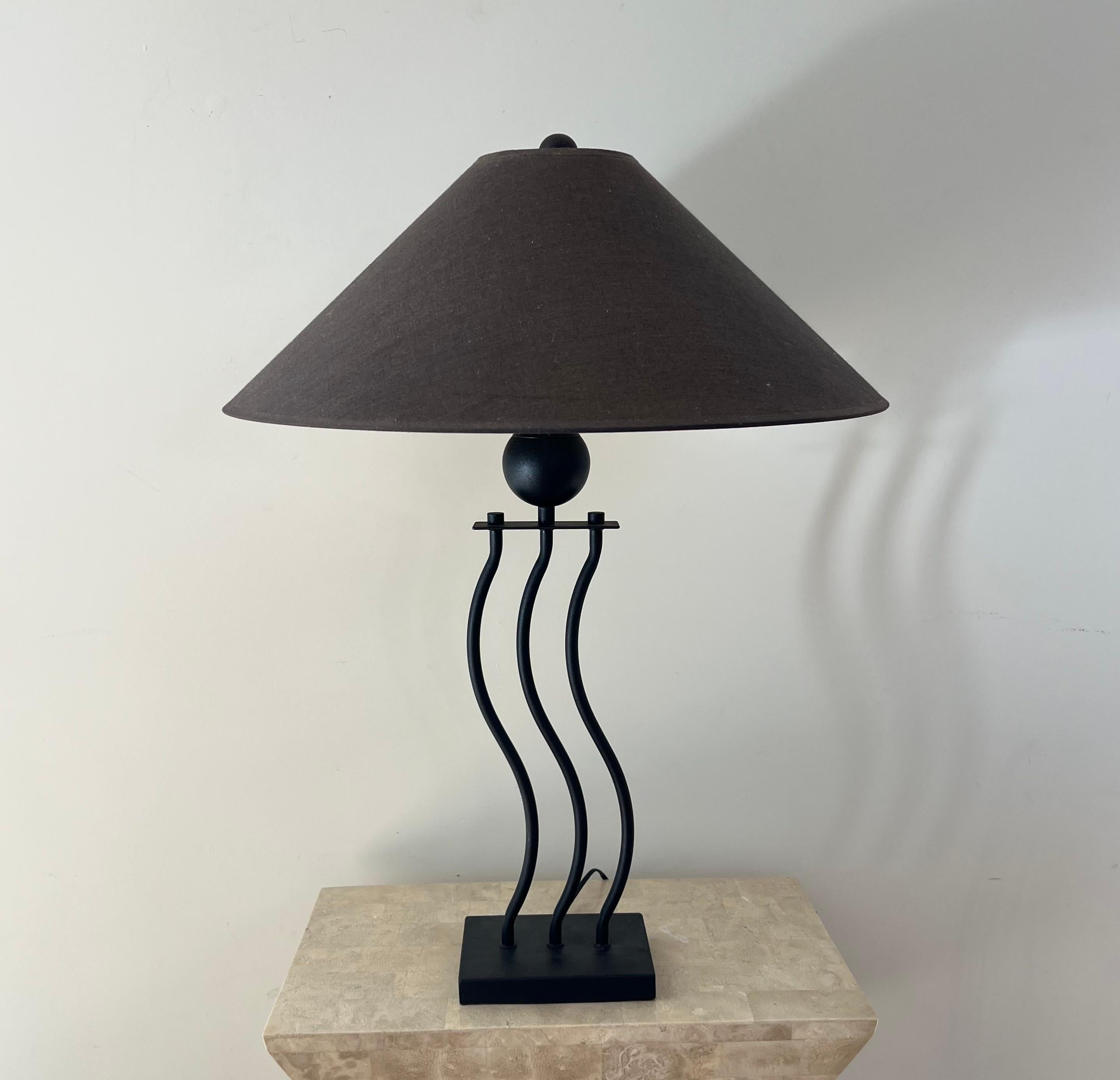 A squiggle table lamp by Underwriter’s Lab, circa late 1980s or early 1990s. Memphis Milano sensibilities. Original shade, works like a dream. Pick up in LA or worldwide delivery available.
Dimensions:
29.75” height, 21.5” diameter; base is 5” x