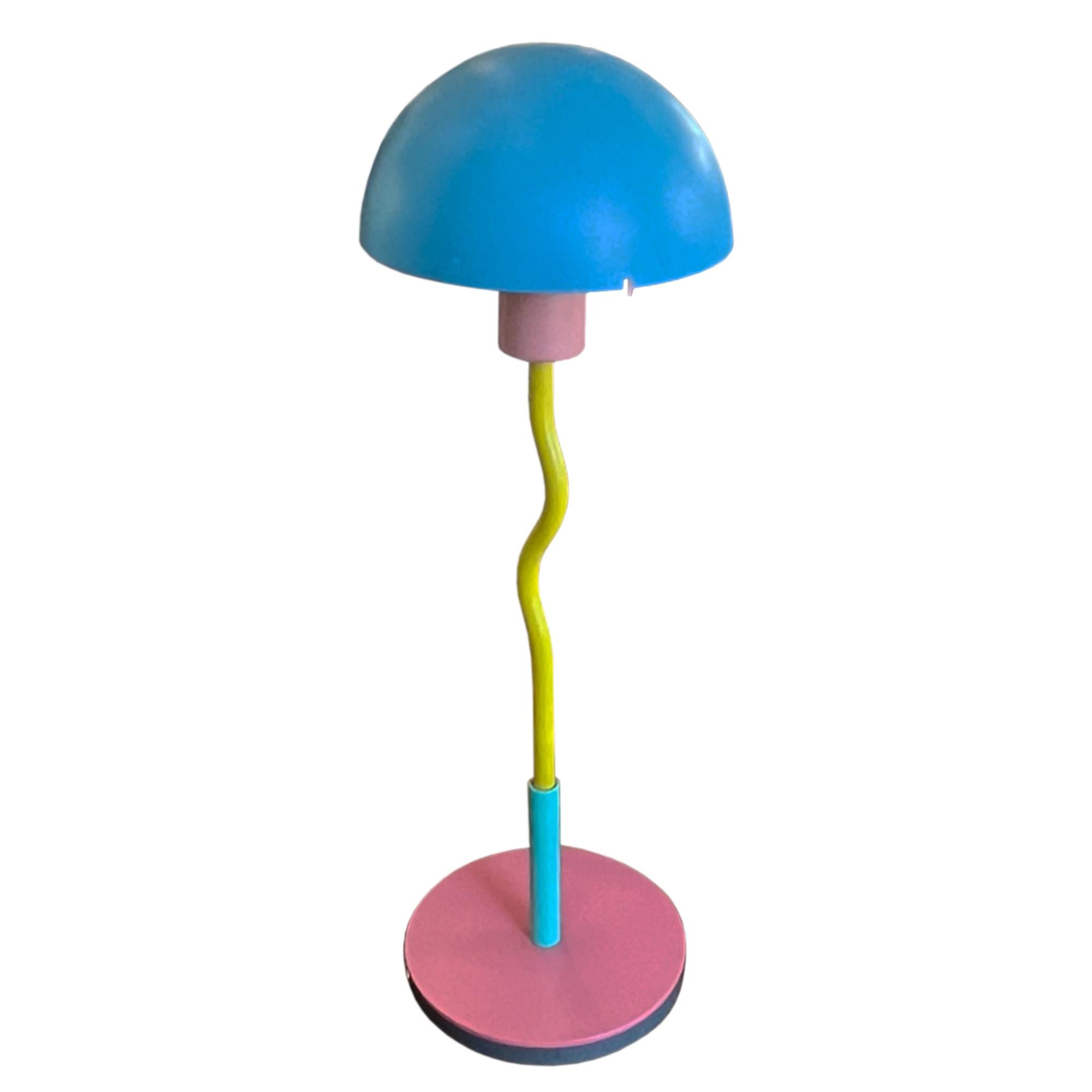 A lovely colourful table lamp - made in the Memphis style and bought from 'Products', 4-6 Northington Street, London, WC1 in the 1980s. This store was located in the heart of London's fashionable Covent Garden district. 

We've had this rewired for