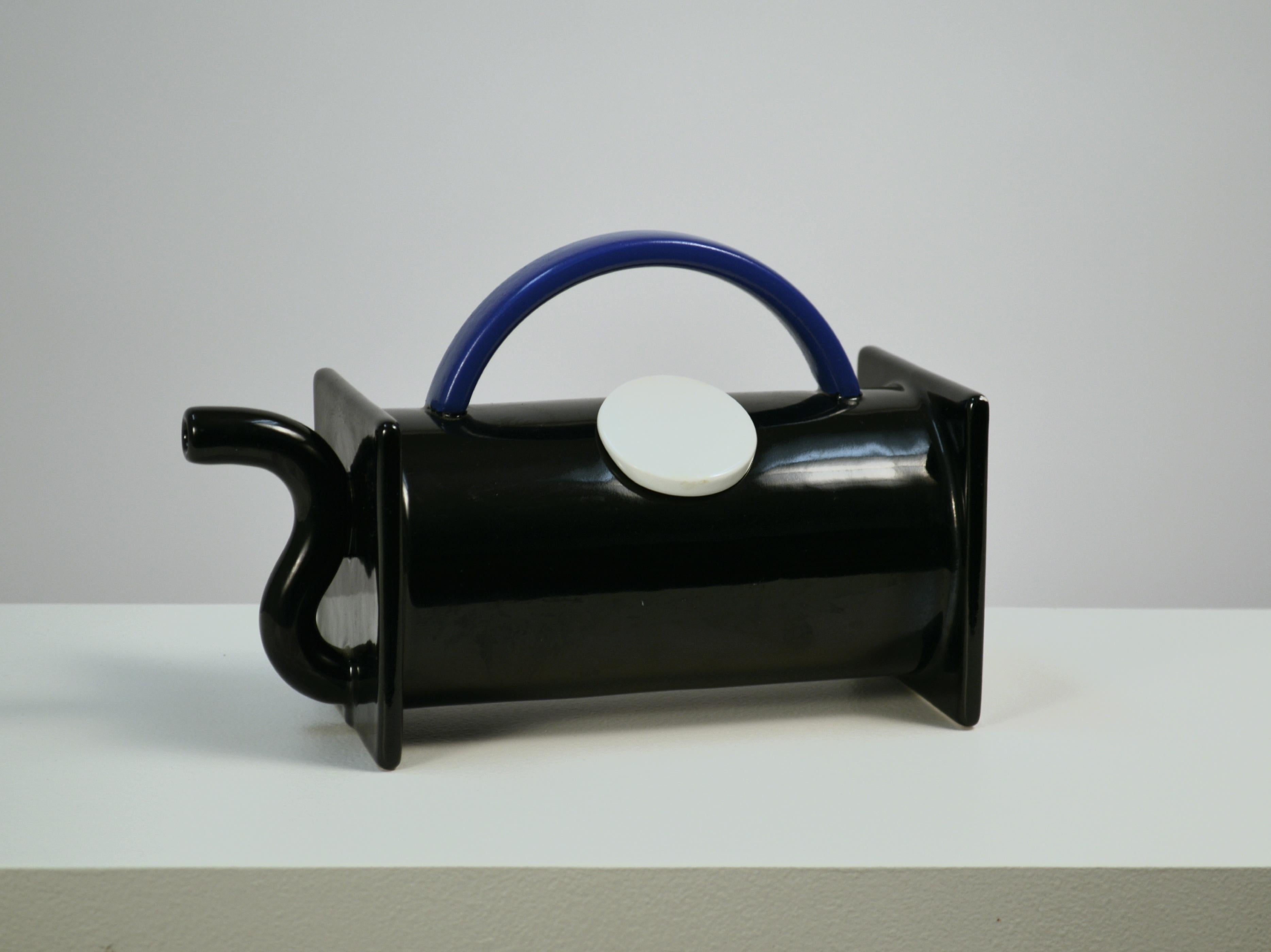 Memphis style teapot designed by Marco Zanini. This striking teapot is part of a collection of functional tableware pieces designed by Zanini in the 1980's, for Italian Ceramics Maker Bitossi. With strong geometric shapes and bold color scheme, this