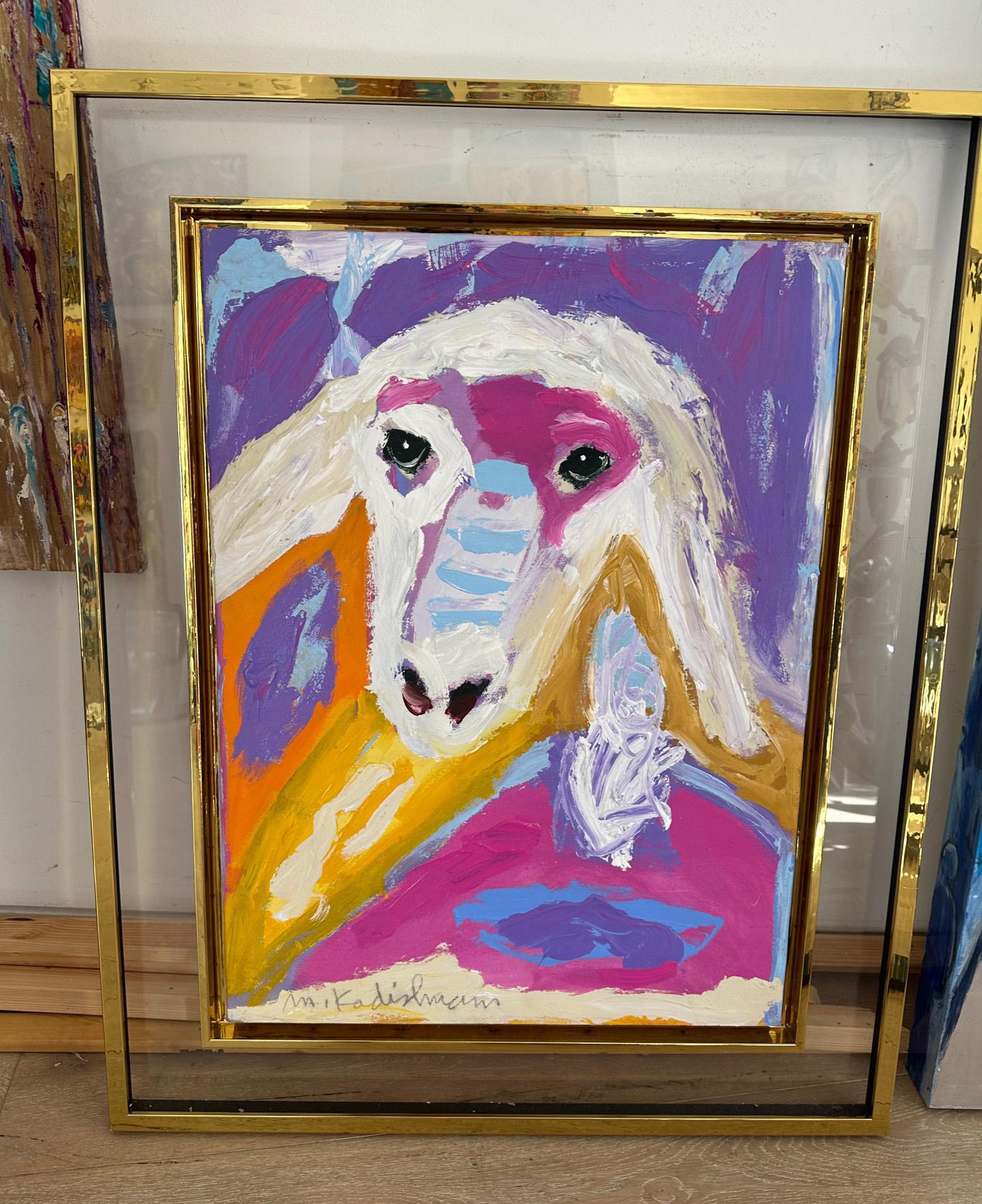 A colorful and beautiful painting by the well-known Israeli artist Menashe Kadishman. 
A sheep's head, its iconic motif, a transparent and gold double frame is very impressive. 
Suitable for lobby, living room and guest rooms.