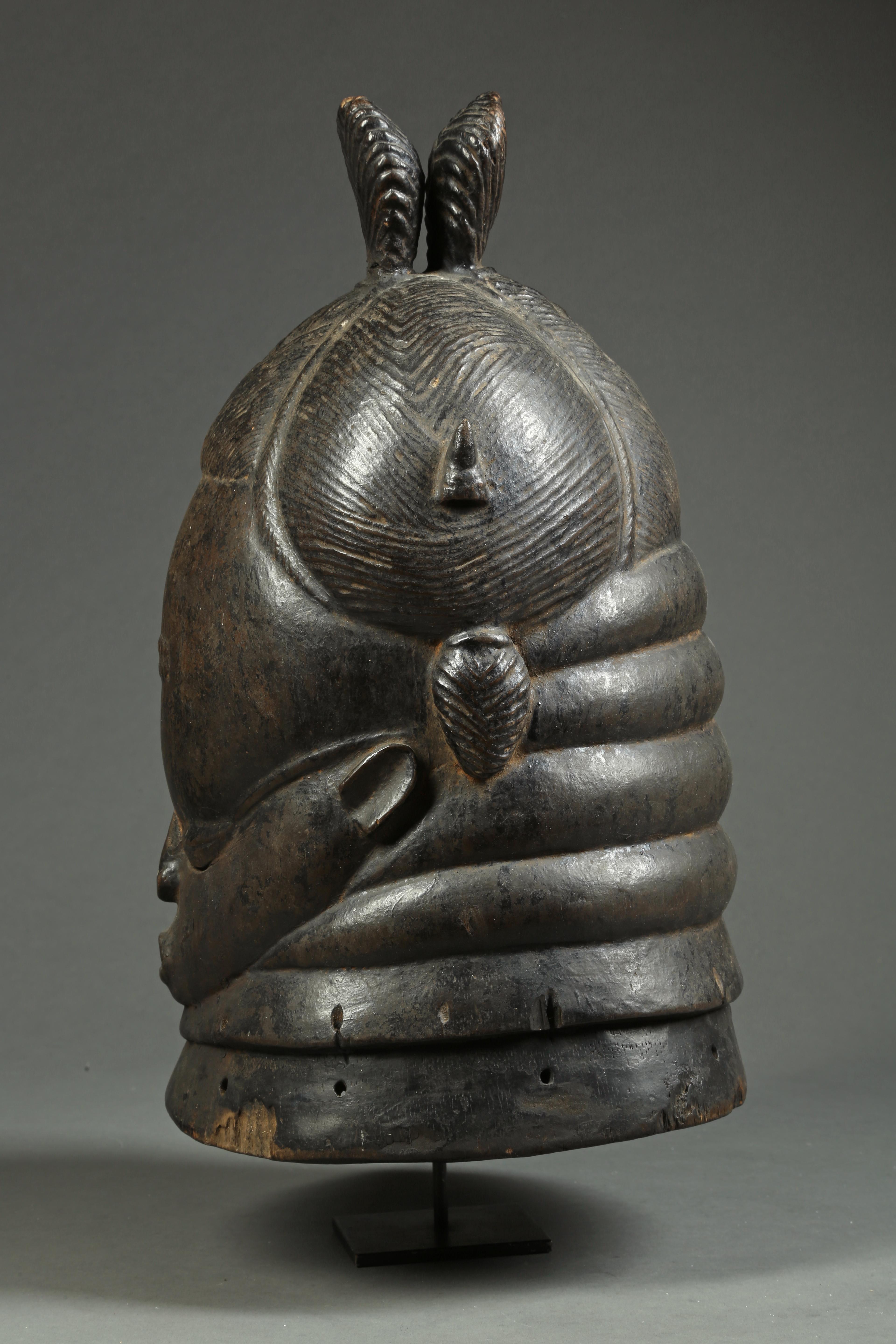 Mende Bundu or Sowei mask of the Sande Society, Sierra Leone, Africa, early 20th century.
The only wood mask in Africa worn exclusively by women. An early, finely carved example with a great expressive face, deep patina from native use.
Some old