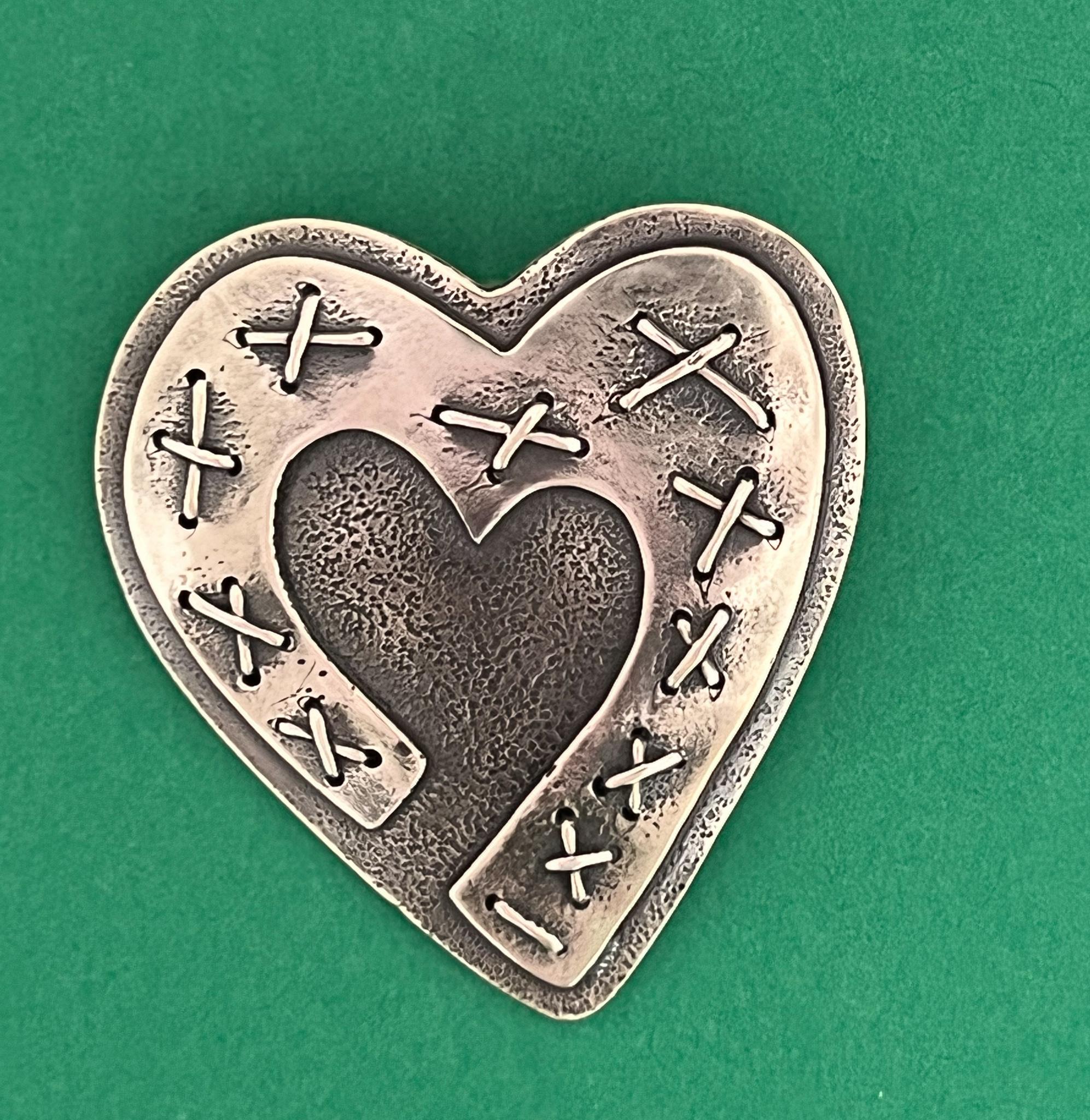 Mended, Heart by Kerry Green, sterling silver, pin, pendant, layered, stitched, modern

Artist jewelry line, ready to wear as a pin or pendant. Made in Santa Fe, New Mexico

Since childhood, Kerry Green has always been creative; painting, drawing,