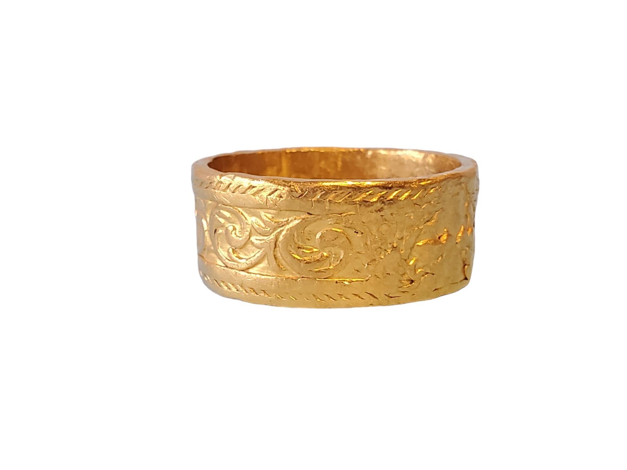 Mene 24kt Yellow Gold 10mm Wide Band

Listed is a signed fine designer 24kt gold band crafted by Mene. This designer specializes in 24kt gold jewelry and makes gorgeous rings and bands for clients world wide. This band is 10mm wide with beautiful