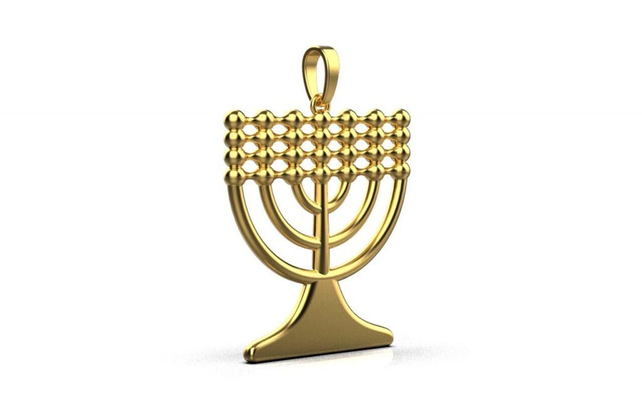 The light of the Menorah Pendant symbolizes an eternal flame with many interpreting the branches as the seven days of creation. The Menorah pendant is Made from solid Gold.

Also available in other precious metal options.

Dimensions: 
Width –