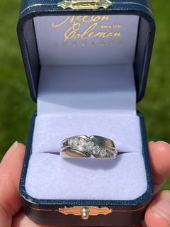 Men's 0.51tcw Diamond and 14k White Gold Contemporary Channel Set Wedding Band