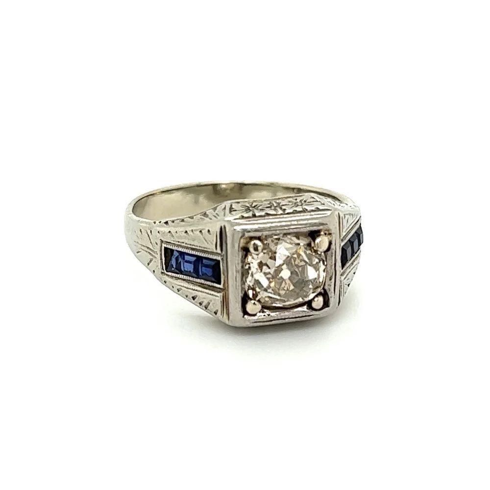 Handsome Gent’s Old Mine Cut Diamond and Calibrated Sapphire Vintage Art Deco Gold Ring. Centering a securely nestled Hand set 1.20 Carat Old Mine Cut Diamond. Accented by Calibrated Sapphires. Ring size 8.5, we offer ring resizing. Hand crafted