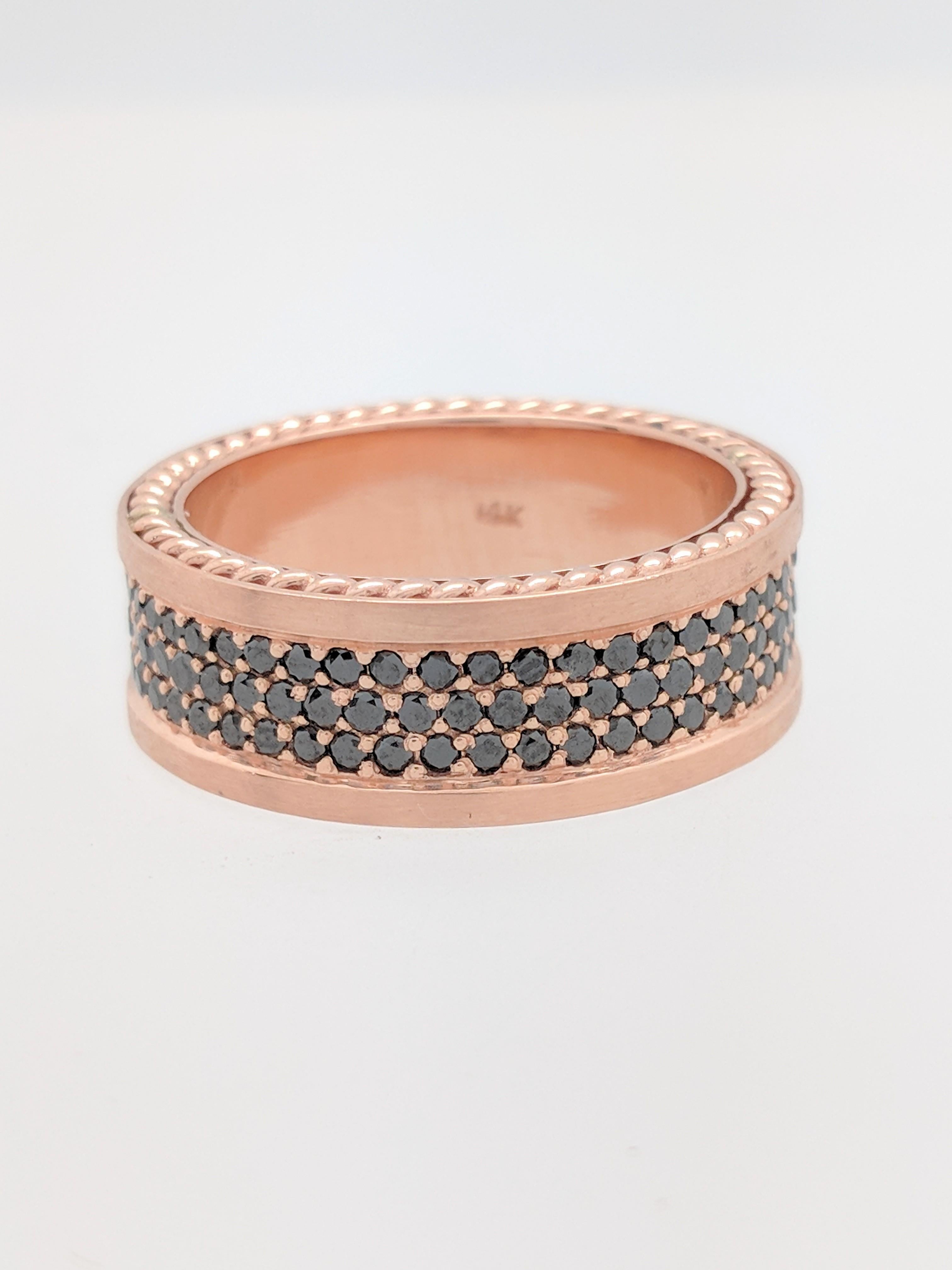 You are viewing a Unique Men's Diamond Eternity Wedding Band. This band is crafted from 14k rose gold and it weighs 16 grams. It a size 10.5 and measures 9mm in width. It features 150 .01ct round natural black diamonds for an estimated 1.50ctw. This