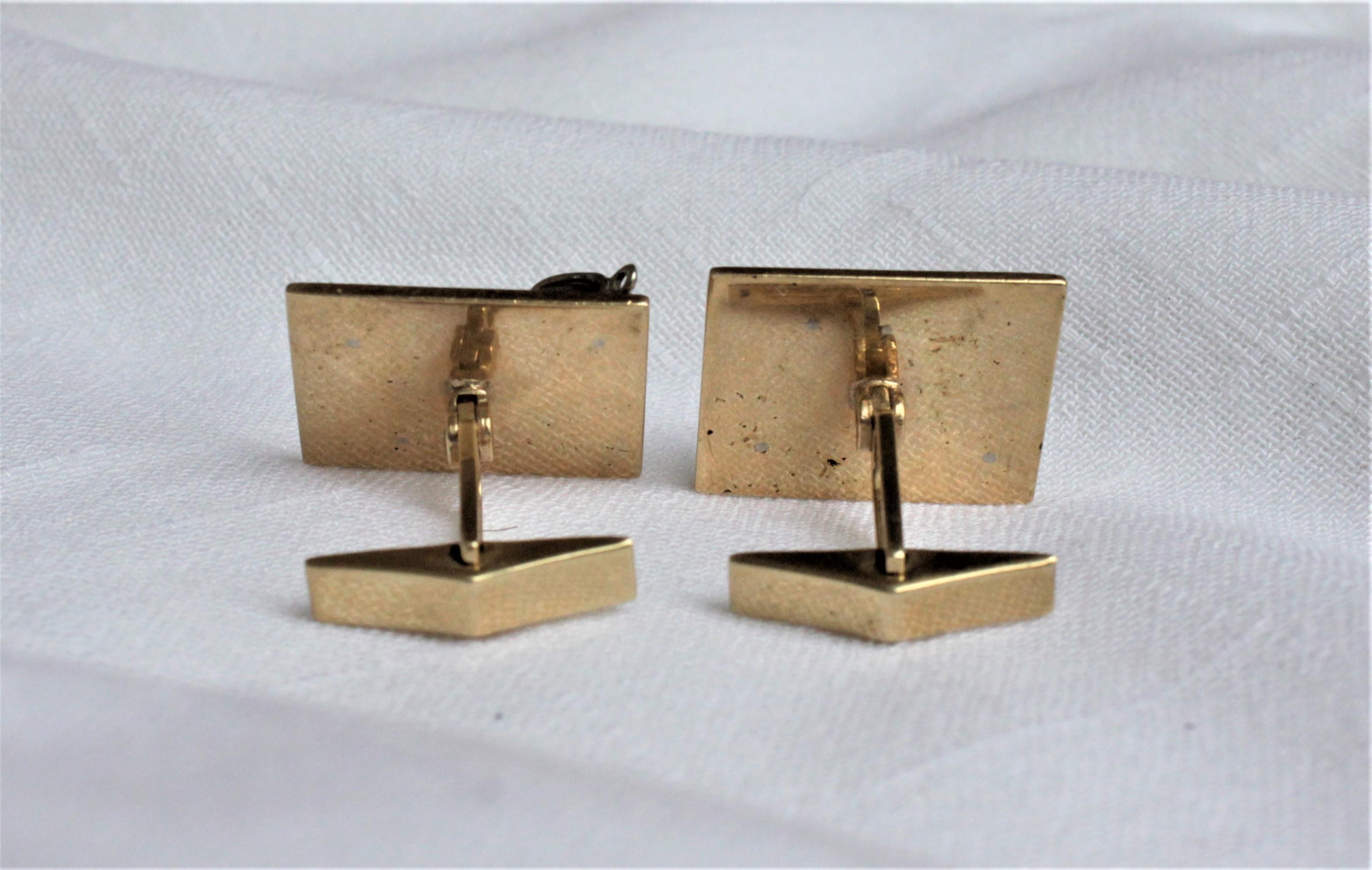 American Men's 14-Karat Yellow and White Gold and Diamond Cufflinks with Jewelers Tools