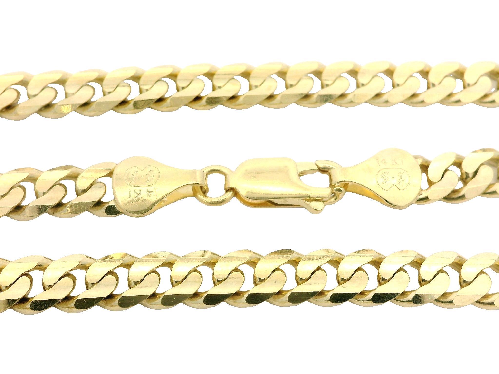 MATERIAL : Or jaune 14k massif 
Poids : 29.6 grammes
Type de chaîne : Maillon de bordure plat
Longueur de la chaîne : 20 pouces (mesurée à côté de la règle)
Largeur de la chaîne : 5.24mm (0.20