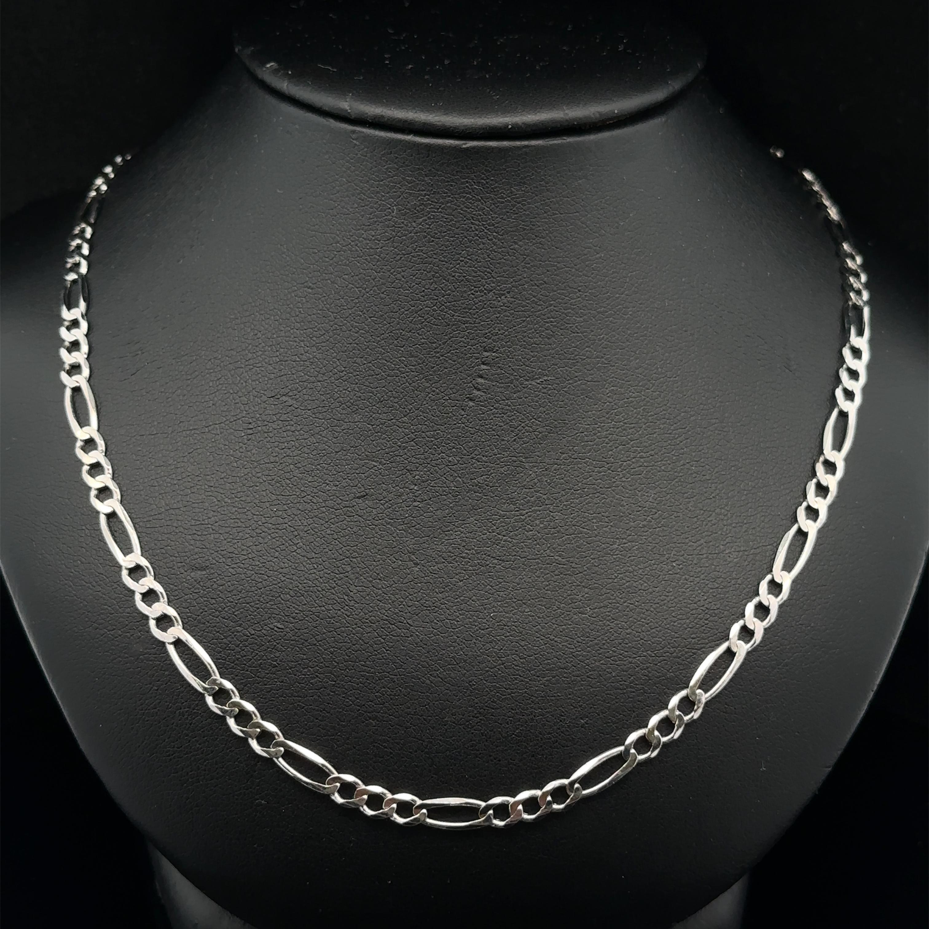 MATERIAL: Massives 14k Weißgold 
Gewicht: 10,7 Gramm 
Typ: 1mm Figaro Gliederkette 
Länge: 22