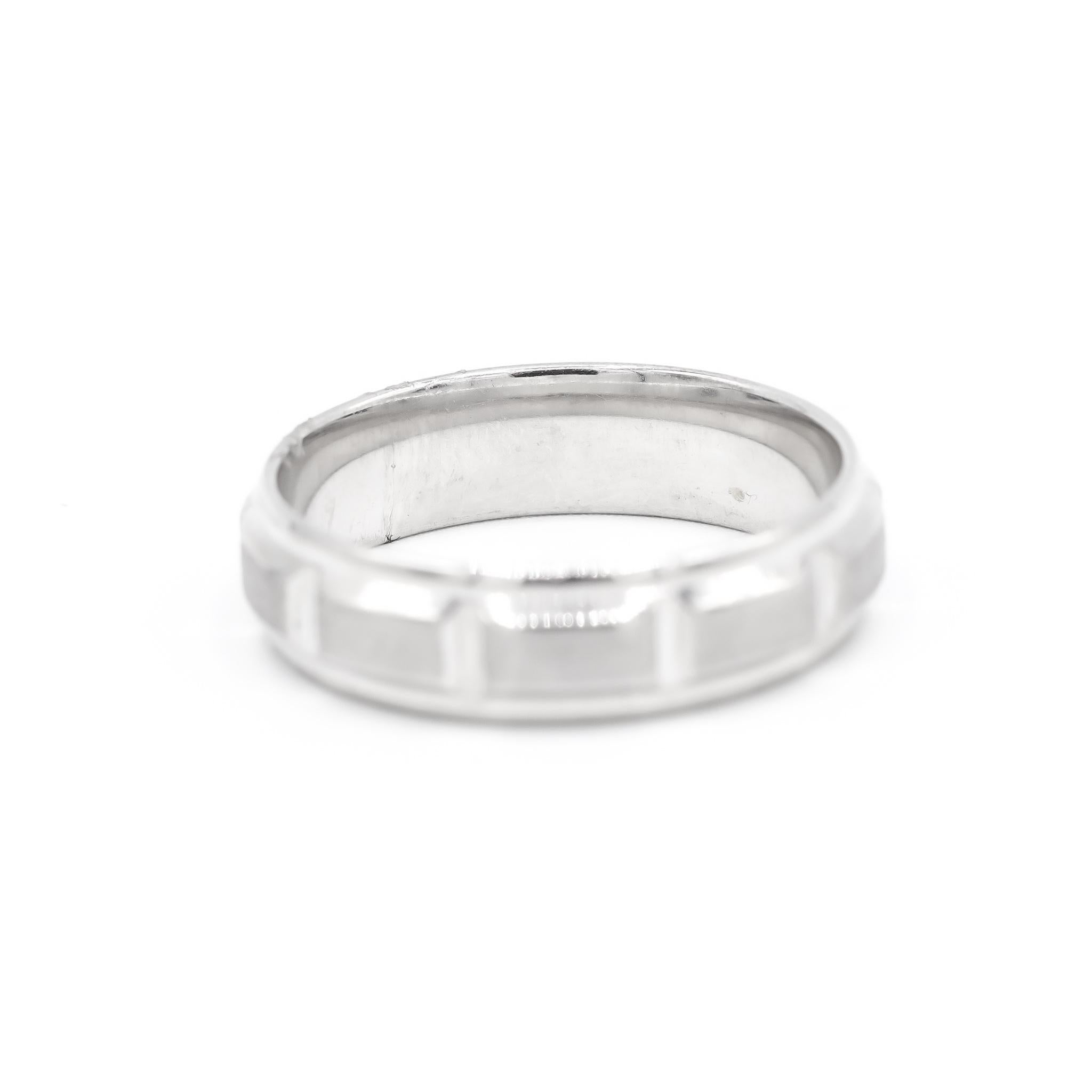One man's custom made brushed & polished rhodium plated 14K white gold, wedding, anniversary band with a soft-square shank. The band is a size 12. The band weighs a total of 8.20 grams. Engraved with 