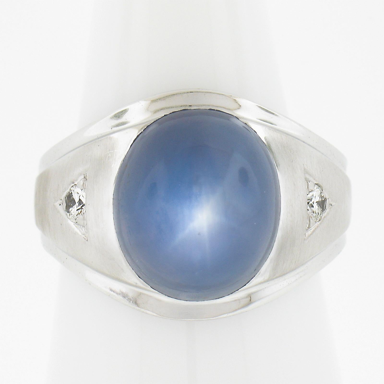 --Stone(s):--
(1) Natural Genuine Star Sapphire - Oval Cabochon Cut - Bezel Set - Vibrant Powder Blue Color - No Heat - 14ct (approx. based on the GIA measurements)
** See Certification Details Below for Complete Info **
(2) Natural Genuine Diamonds