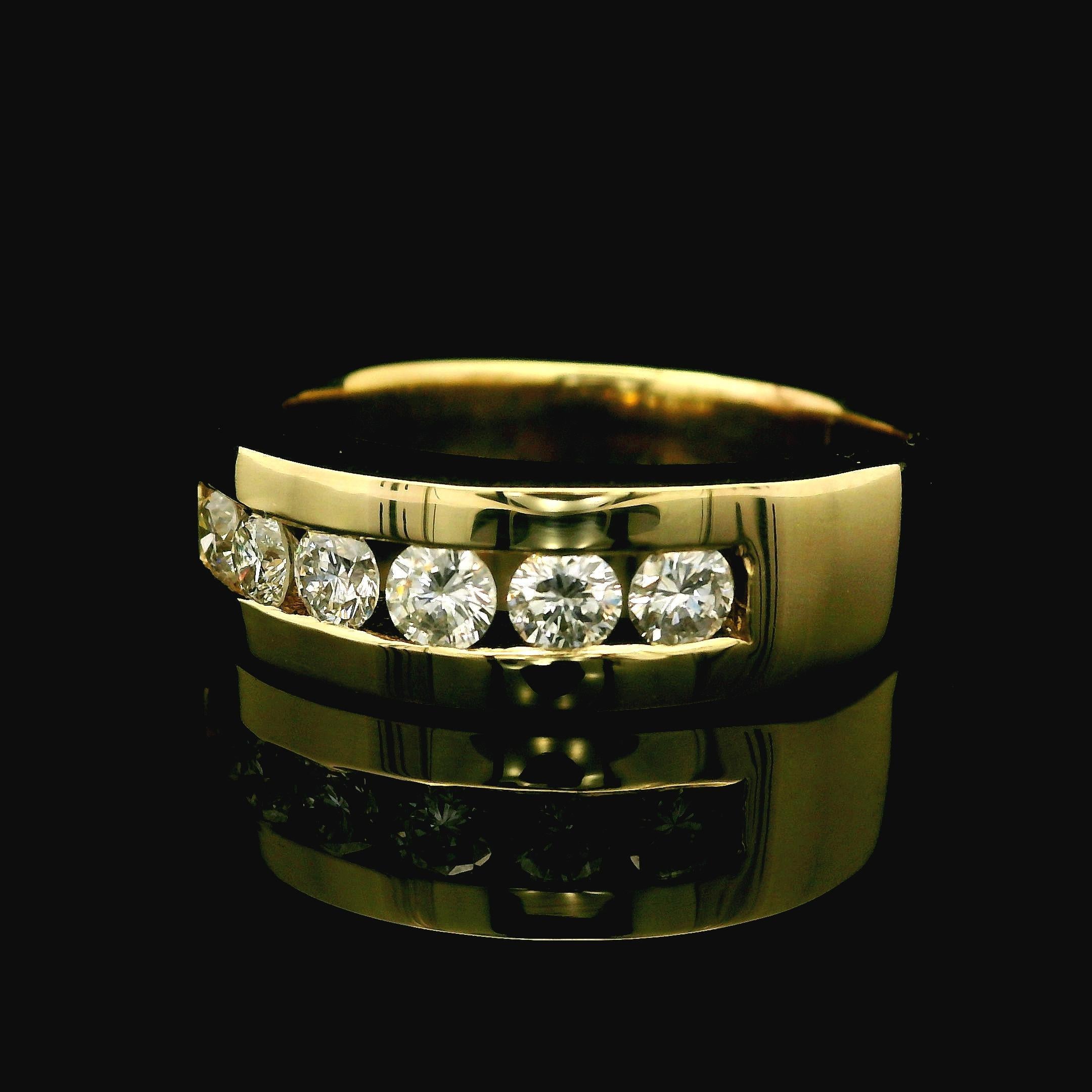 --Stone(s):--
(6) Natural Genuine Diamond - Round Brilliant Cut - Channel Set - G/H Color - SI2/I1 Clarity - 0.90ctw (approx.)

Material: Solid 14k Yellow Gold
Weight: 11.13 Grams
Ring Size: 11.0 (Fitted on a finger. We can custom size this ring.