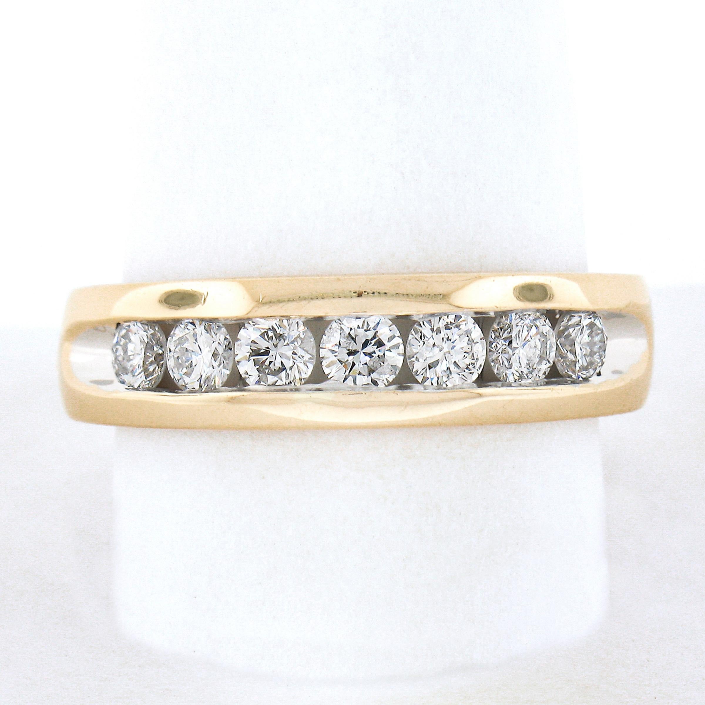 --Stone(s):--
(7) Natural Genuine Diamonds - Round Brilliant Cut - Channel Set - SI1-I1 Clarity - F/G Color
Total Carat Weight:	1.05 (approx.)

Material: Solid 14K Yellow Gold
Weight: 8.65 Grams
Ring Size: 10.5 (Fitted on a finger. We can custom