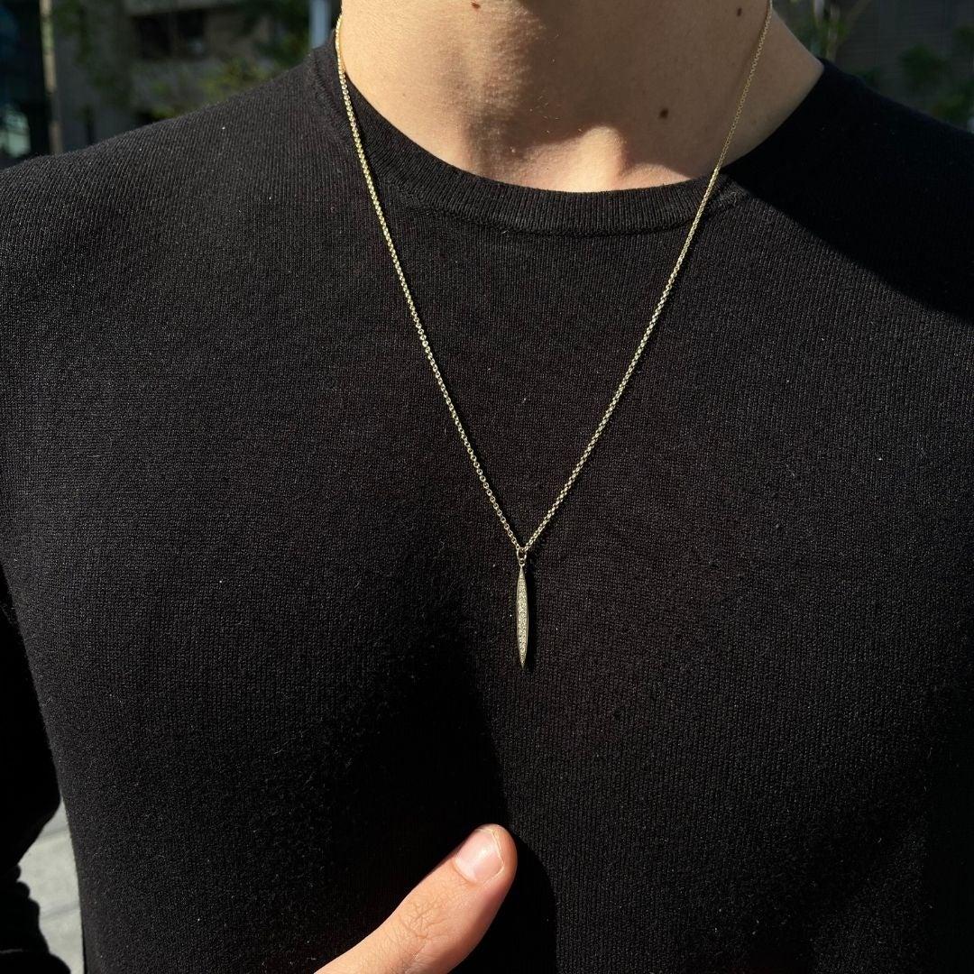Men’s 14K Yellow Gold Diamond Pendant Diamond Necklace for Him by Shlomit Rogel.

Simple yet timeless, this diamond necklace is part of Rogel's collection for men. Crafted from 14k solid yellow gold and set with 11 white diamonds, this necklace is