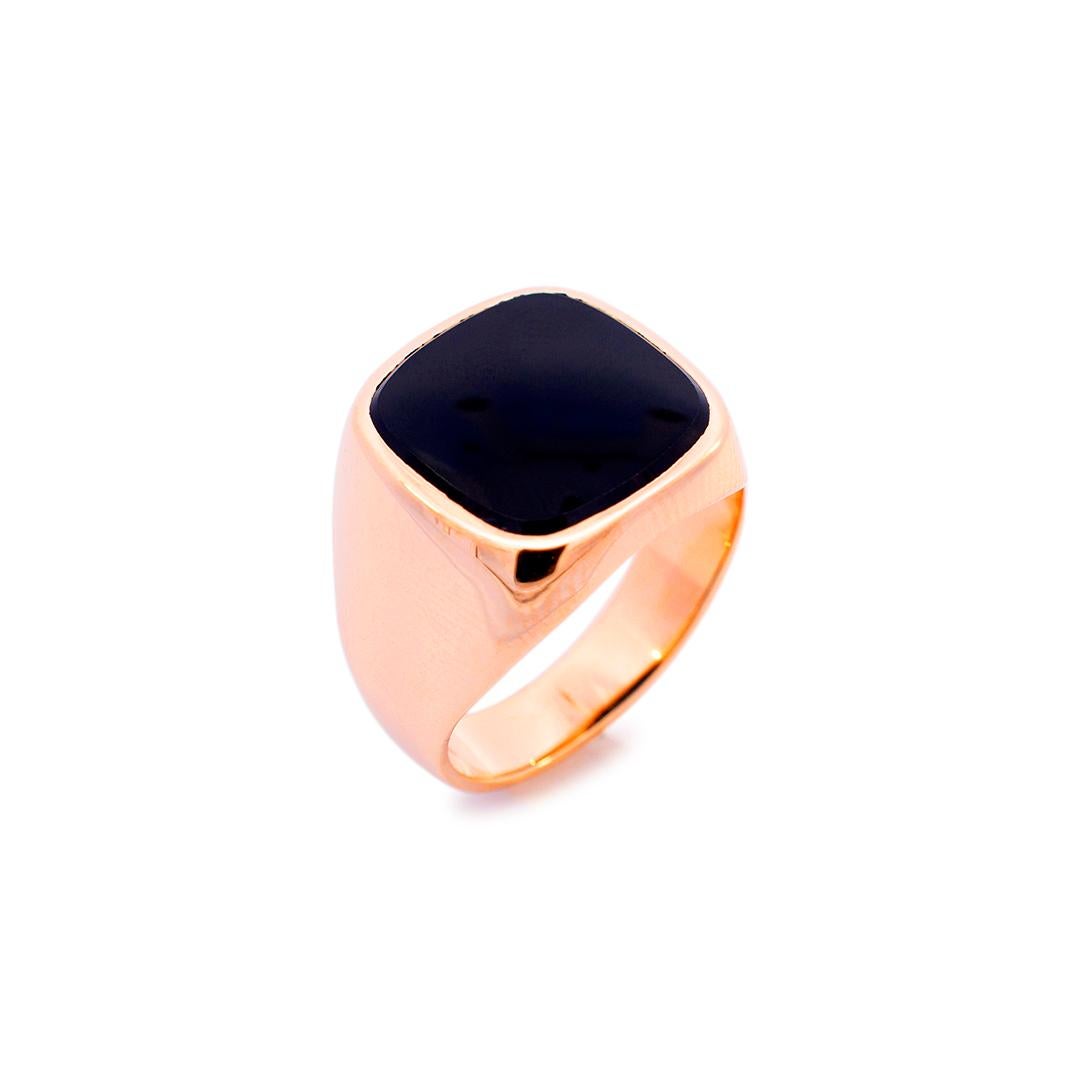 Men's custom made polished 14K yellow gold, onyx cocktail ring with a half round shank. The ring is a size 9.5 and measures approximately 16.80mm tapering to 4.90mm in width and weighs a total of 11.56 grams. Engraved with 