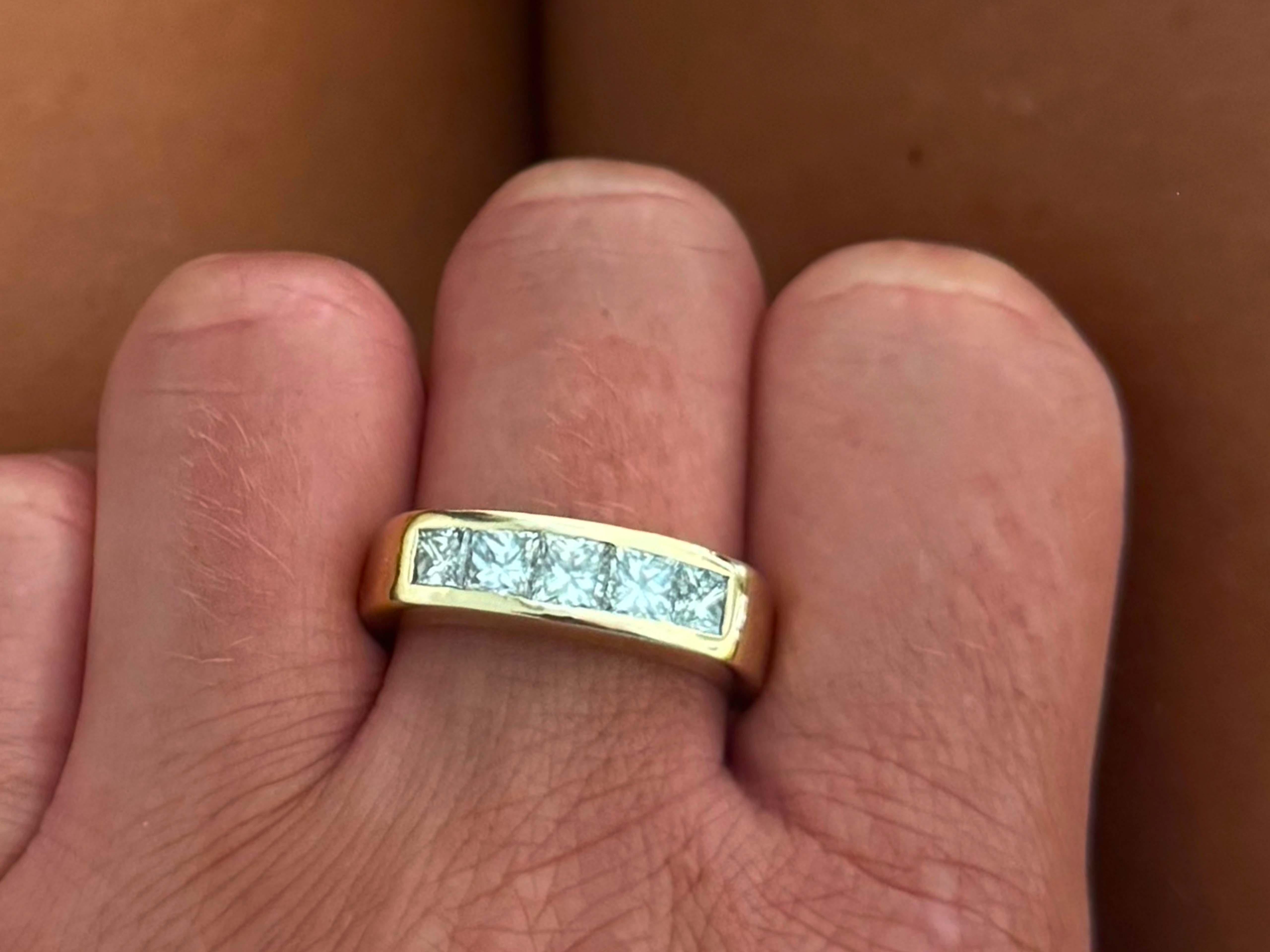 Item Specifications:

Metal: 14k Yellow Gold

Diamond Count: 5 princess cut

Total Diamond Carat Weight: ~1.75 carats 

Diamond Color: F-G

Diamond Clarity: VS

Ring Size: 9.5

Total Weight: 8.0 Grams

Stamped: 