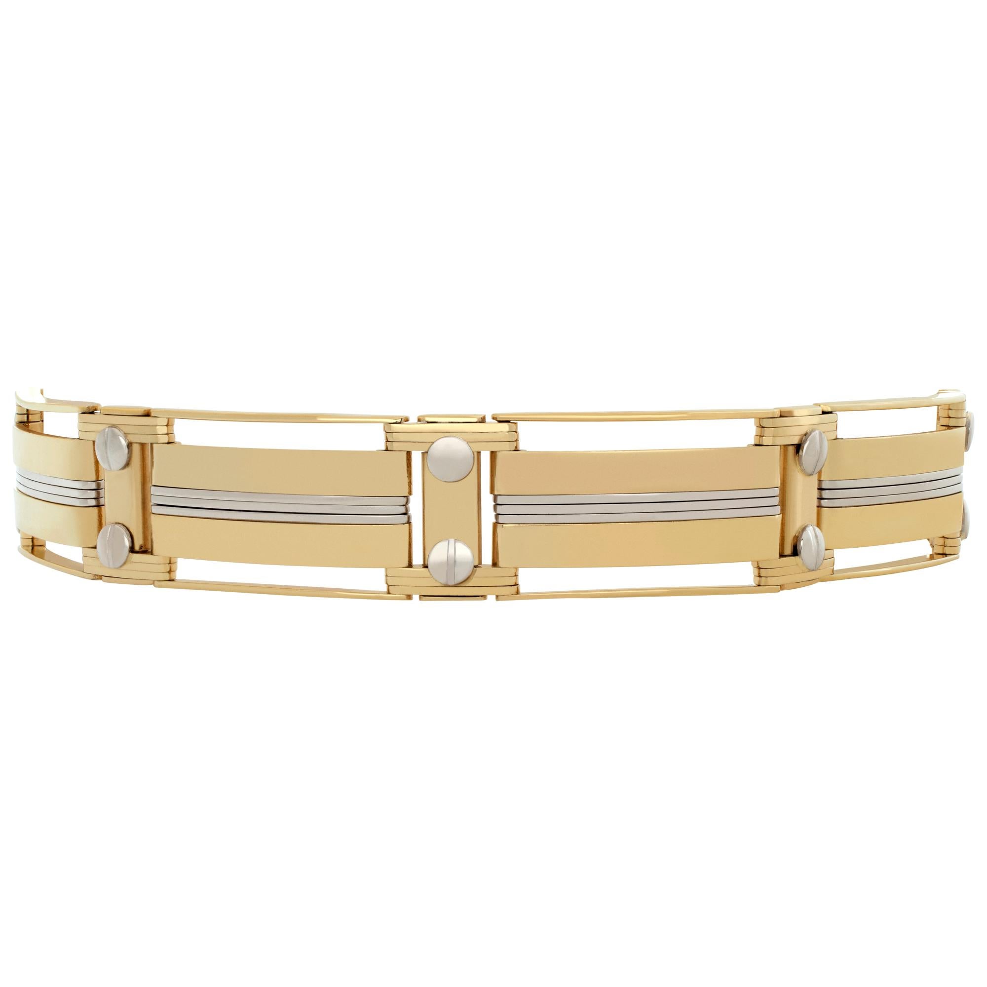 Mens 18k white and yellow gold bracelet with unique design and screws. Length 8.5 inches. Width 12mm.
