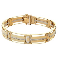Mens 18k gold bracelet with unique design and screws