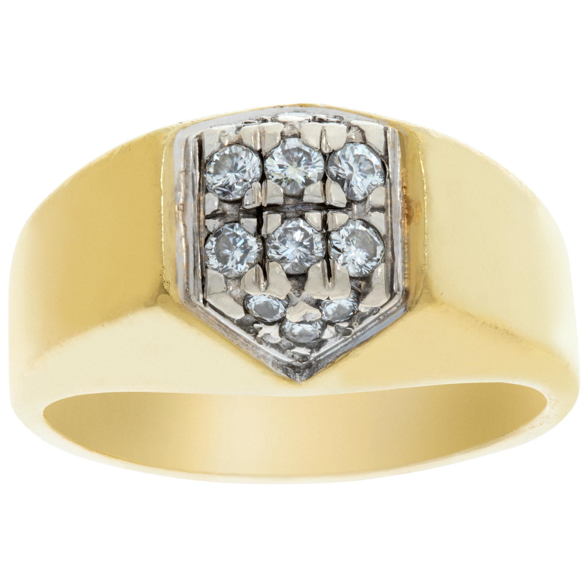 Gents 18k yellow gold diamond ring with approximately 0.18 carat in diamonds. Size 9.This Diamond ring is currently size 9 and some items can be sized up or down, please ask! It weighs 8.9 pennyweights and is 18k.
