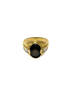 18K Yellow Gold Ring with Black Star Sapphire and Baguette Diamond Accents