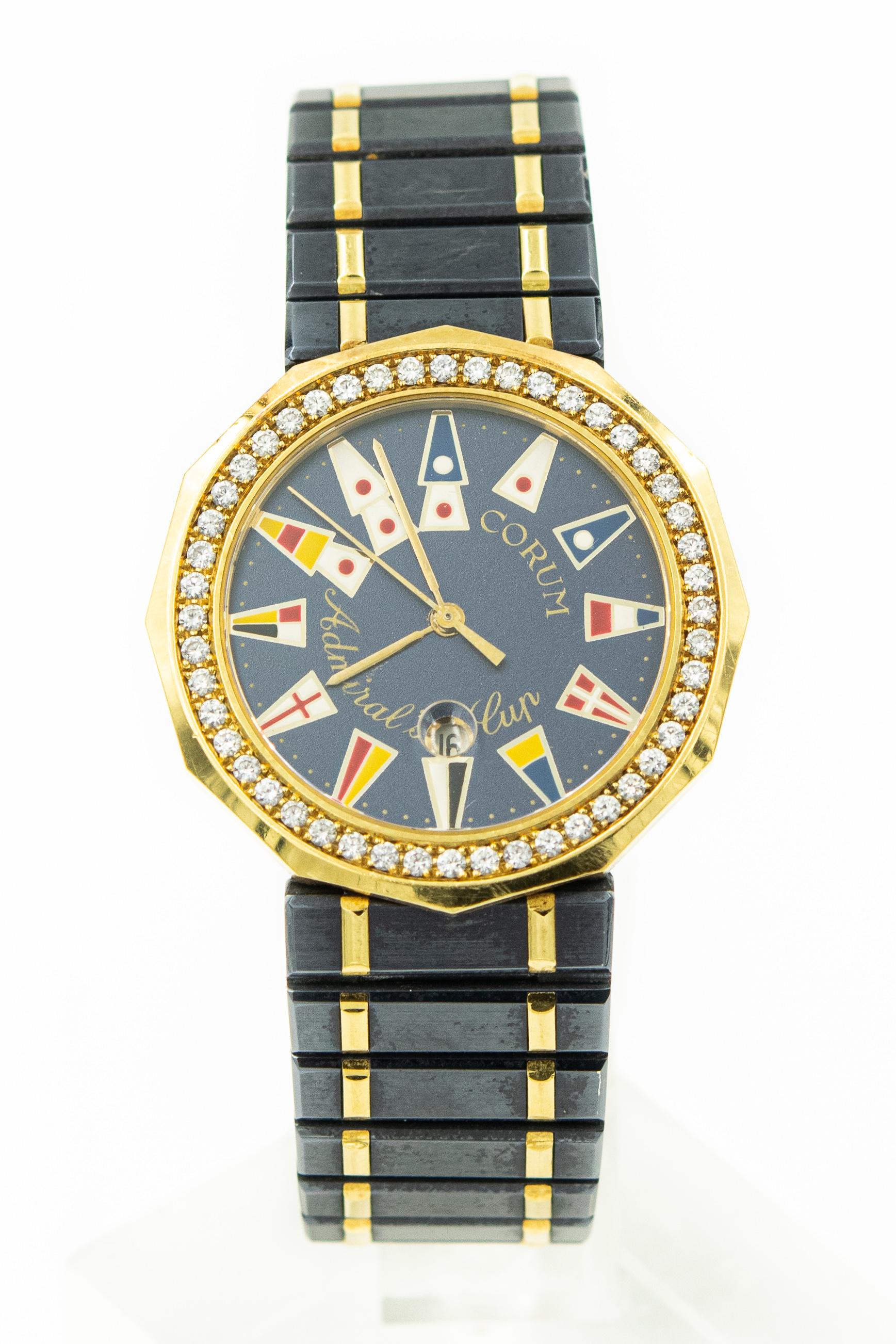 Men's Admiral's Cup Corum Watch 
Reference Number: 39.812.33V52 Serial # 425239
12-sided 34 mm case and maritime pennants on the dial. Crafted in polished 18kt yellow gold and blue ceramic with an integral bracelet that finishes with a deployment
