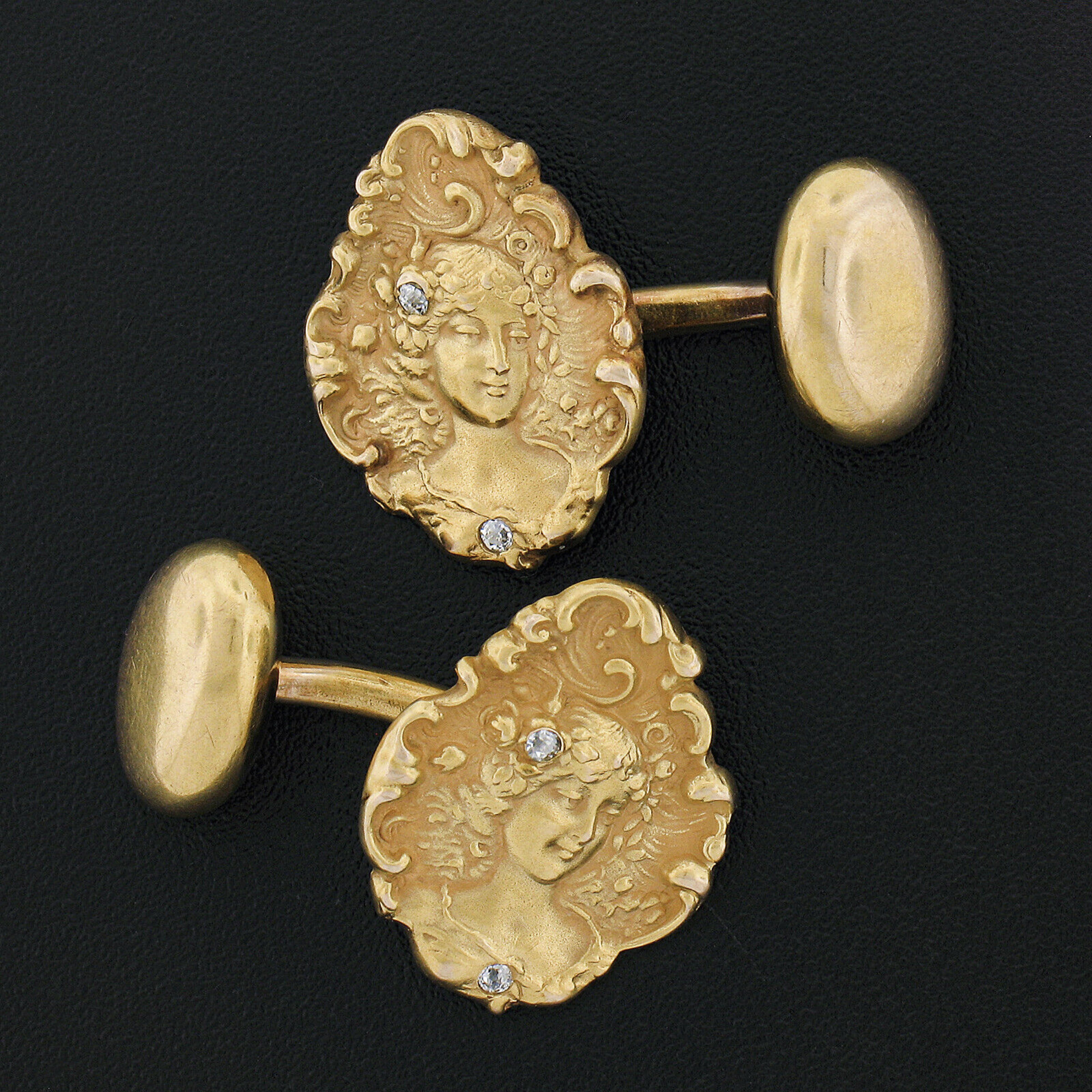 These fine art nouveau period cuff links are crafted in solid 14k yellow gold and feature absolutely spectacular detailing throughout their front panel showing a lovely nymph lady design at their center surrounded by intricate scroll work with
