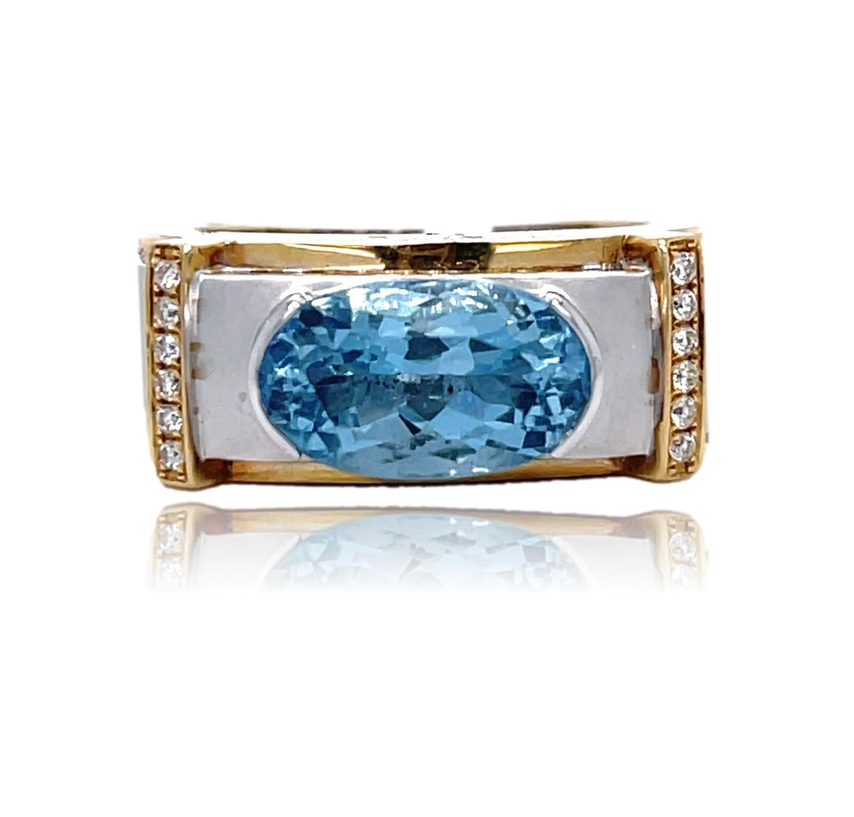 This unique Two Tone Men's ring has a sparkling blue top quality oval Aquamarine center surrounded by brilliant cut diamonds  and is set in 14K white and yellow gold. It comes in a beautiful box ready for the perfect gift!

14KW:            11.75