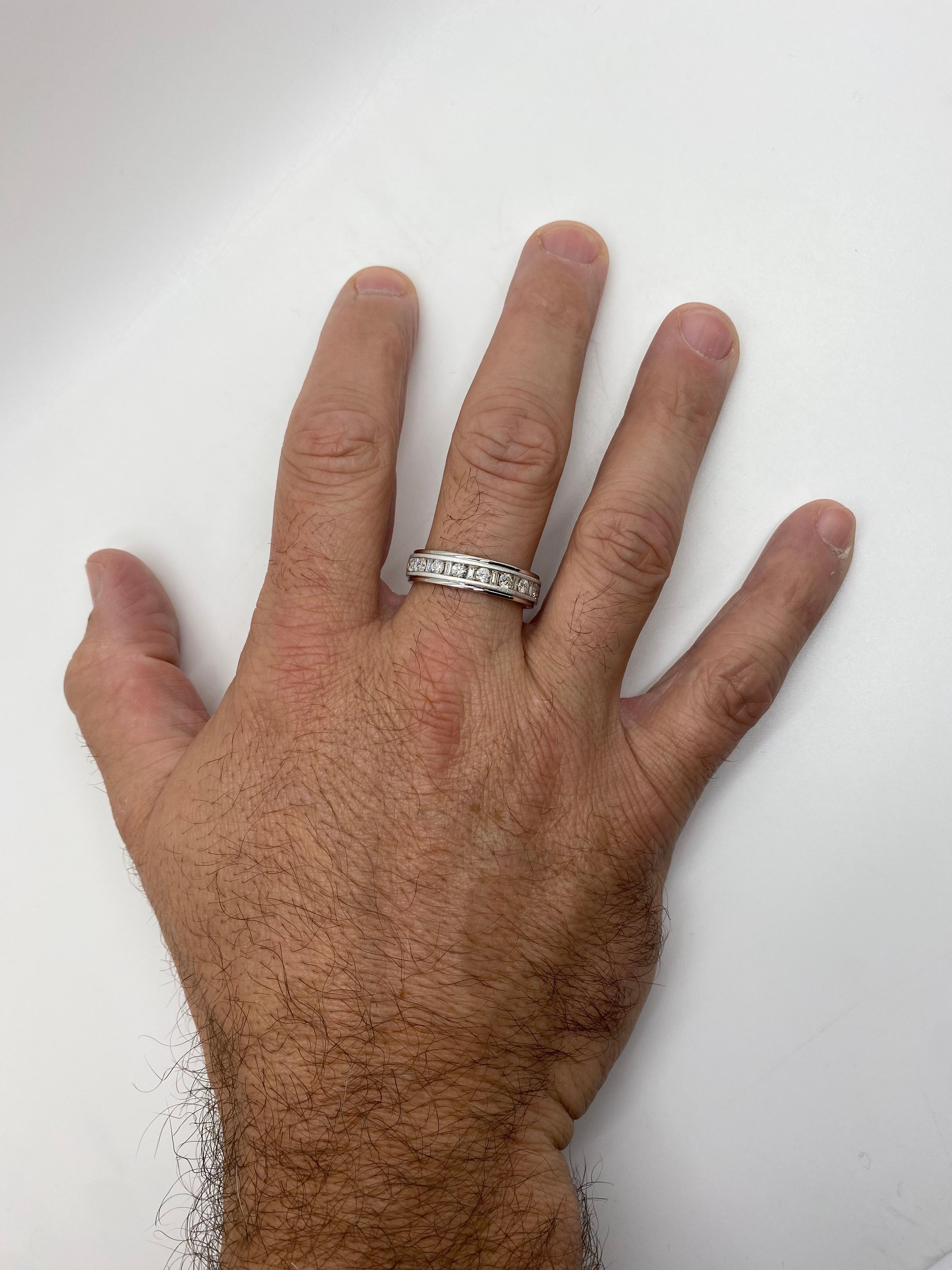 Stunning men's diamond wedding band with matte and high polish finish featuring Round and Baguette cut diamonds. 

Diamond Cut: Round Brilliant & Baguette cut 
Total Diamond Carat Weight: 1.25CTW
Average Diamond Color: F-G
Average Diamond Clarity: