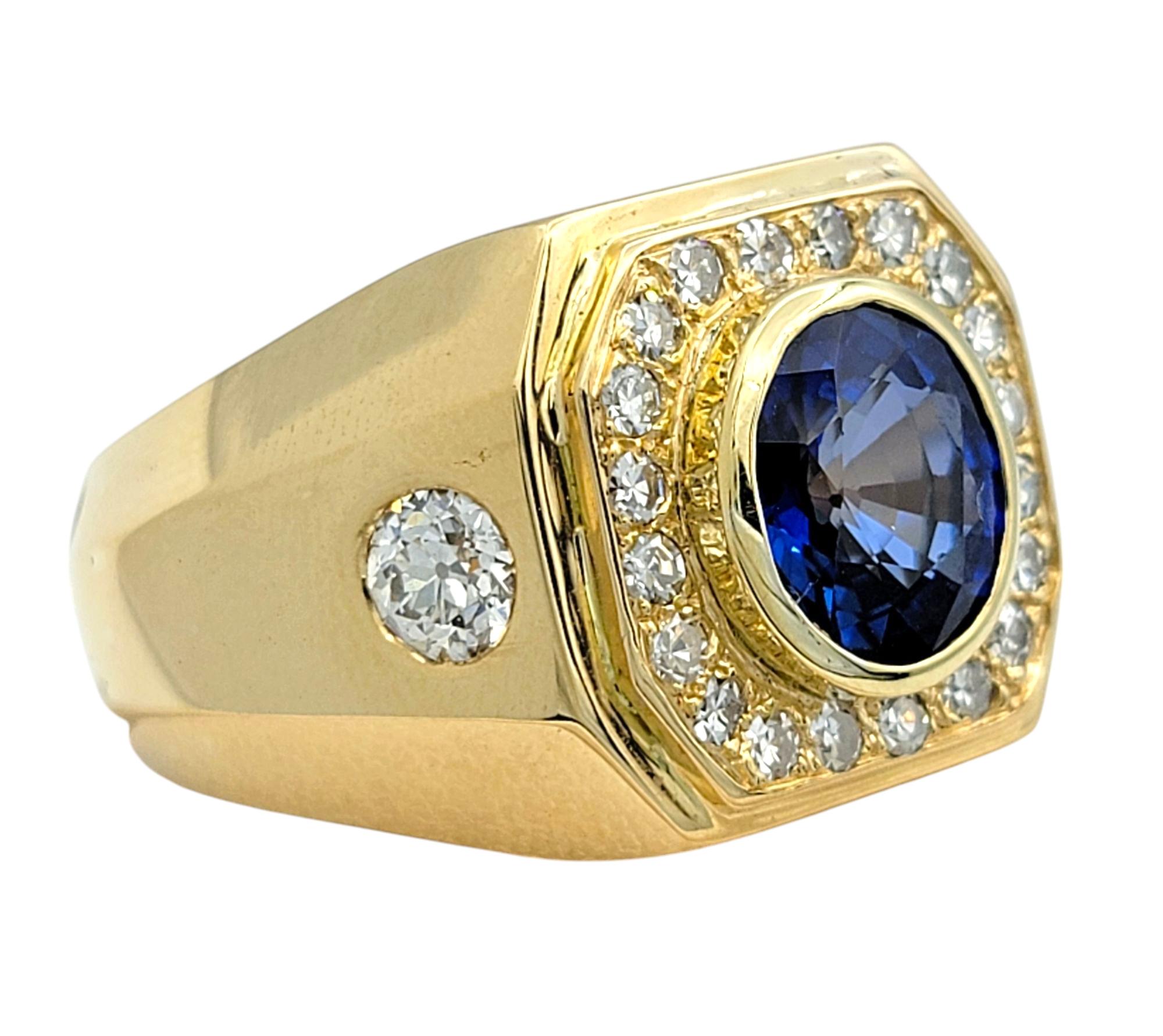 Ring Size: 12.75

A striking statement of refined elegance, this exceptional men’s ring features a mesmerizing oval-cut blue sapphire at its center, exuding depth and brilliance. Encased in a bold 18 karat yellow gold setting, the sapphire is