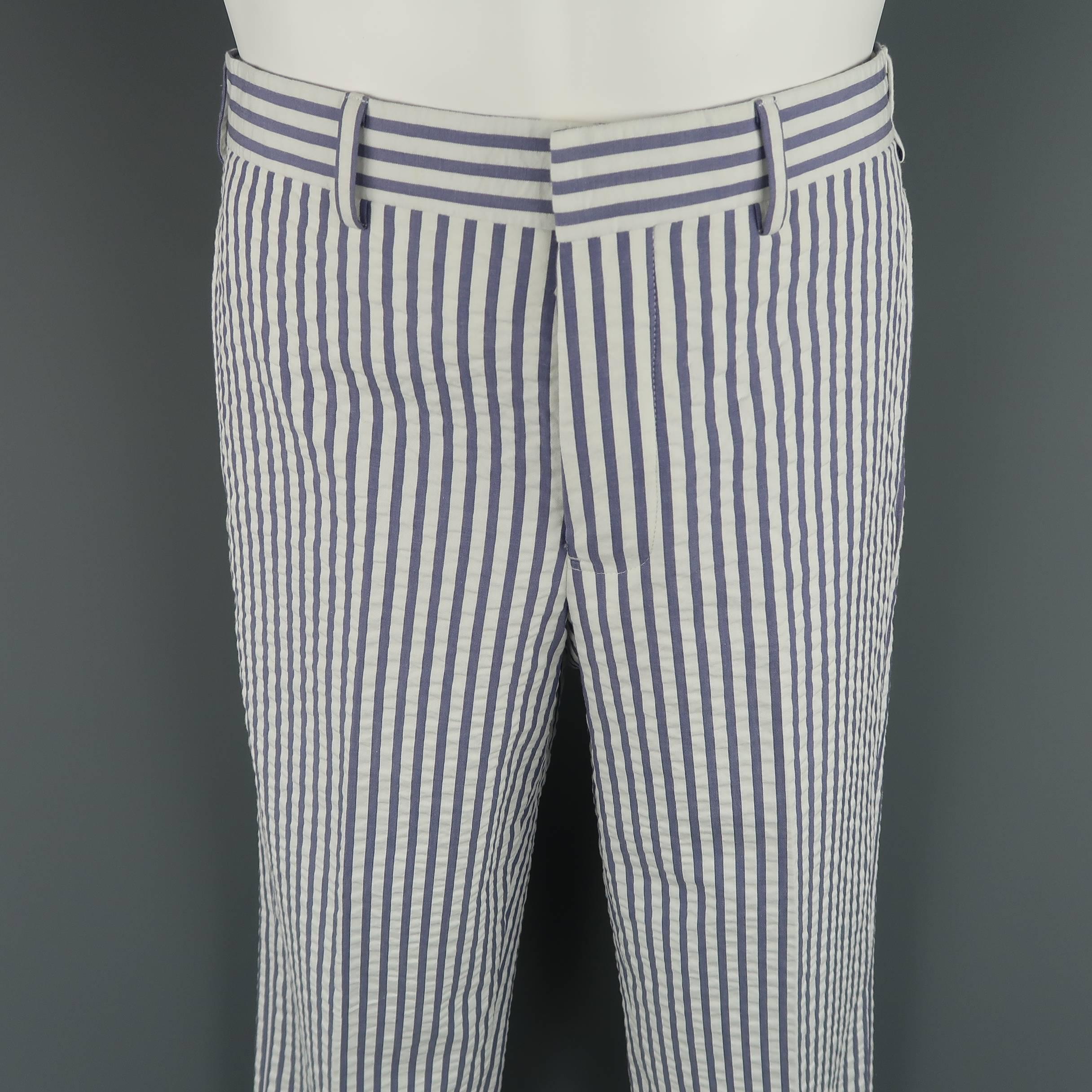 Flat front BLACK FLEECE dress pants come in white and blue striped textured cotton fabric with a classic fit and cuffed hem.
 
Excellent Pre-Owned Condition.
Marked: BB0
 
Measurements:
 
Waist: 30 in. (+ 2 in. )
Rise: 10 in.
Inseam: 30 in.
 
(Let