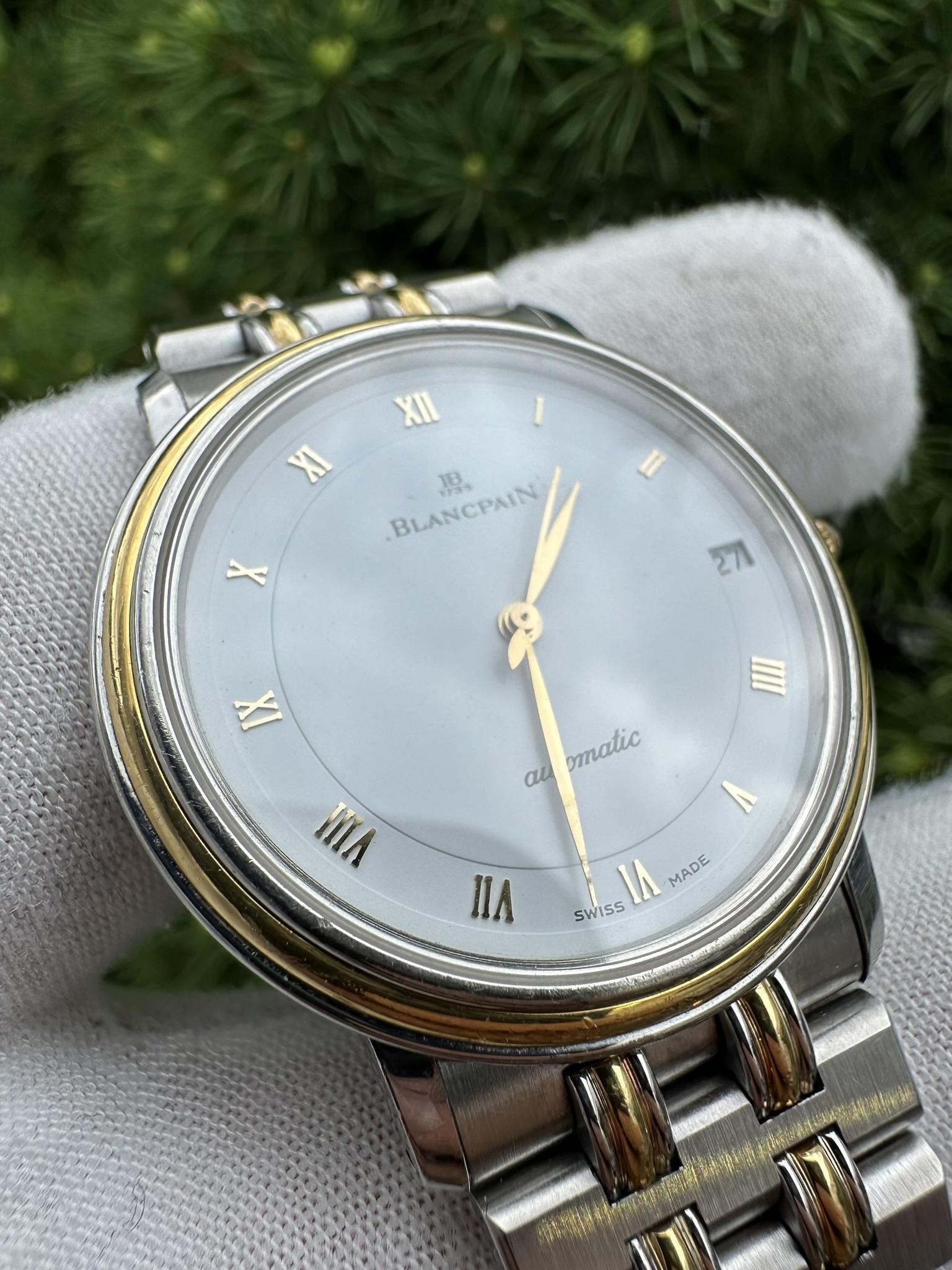 Watchmaker: Blancpain
Model: Villeret Number 38
Movement: Automatic - Self Winding - 19 Jewels - Caliber 95 - Swiss Made
Case & Bracelet Material: Stainless Steel & Solid 18k Yellow Gold
Case Size: 34mm (not counting the crown)
Case Height: 37.2mm