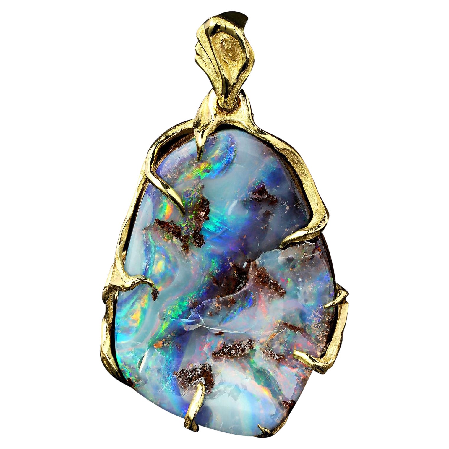 14k Gelbgold-Anhänger mit Boulder-Opal

opal Herkunft - Australien

abmessungen des Opals - 0,12 x 0,67 x 1,02 Zoll / 3 x 17 x 26 mm

gewicht des Opals - 22,25 Karat

länge des Anhängers - 1,22 Zoll / 31 mm

gewicht des Anhängers - 7,21 Gramm