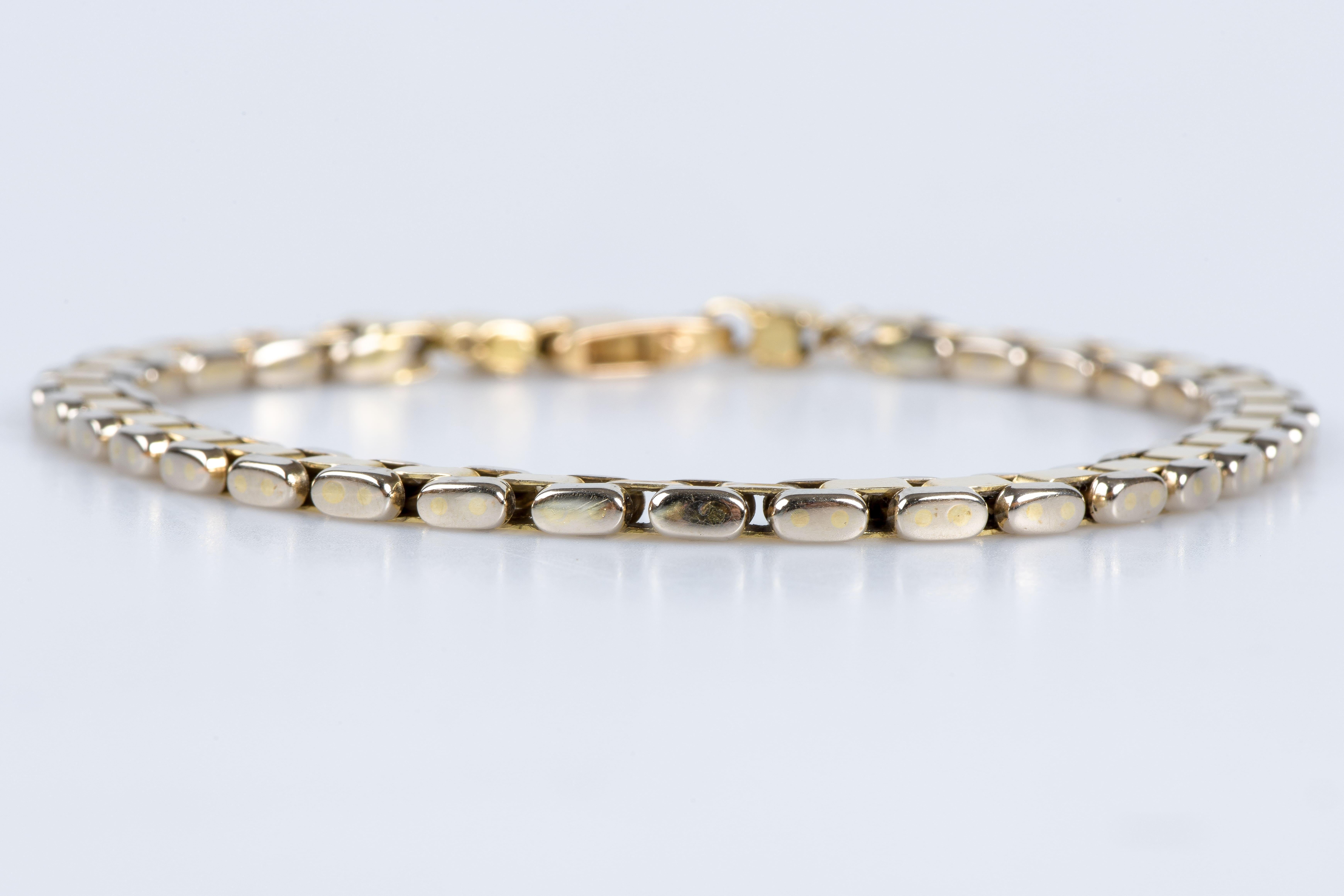 Men’s bracelet in soft 18K yellow and white bicolor gold mesh.  In Excellent Condition For Sale In Monte-Carlo, MC