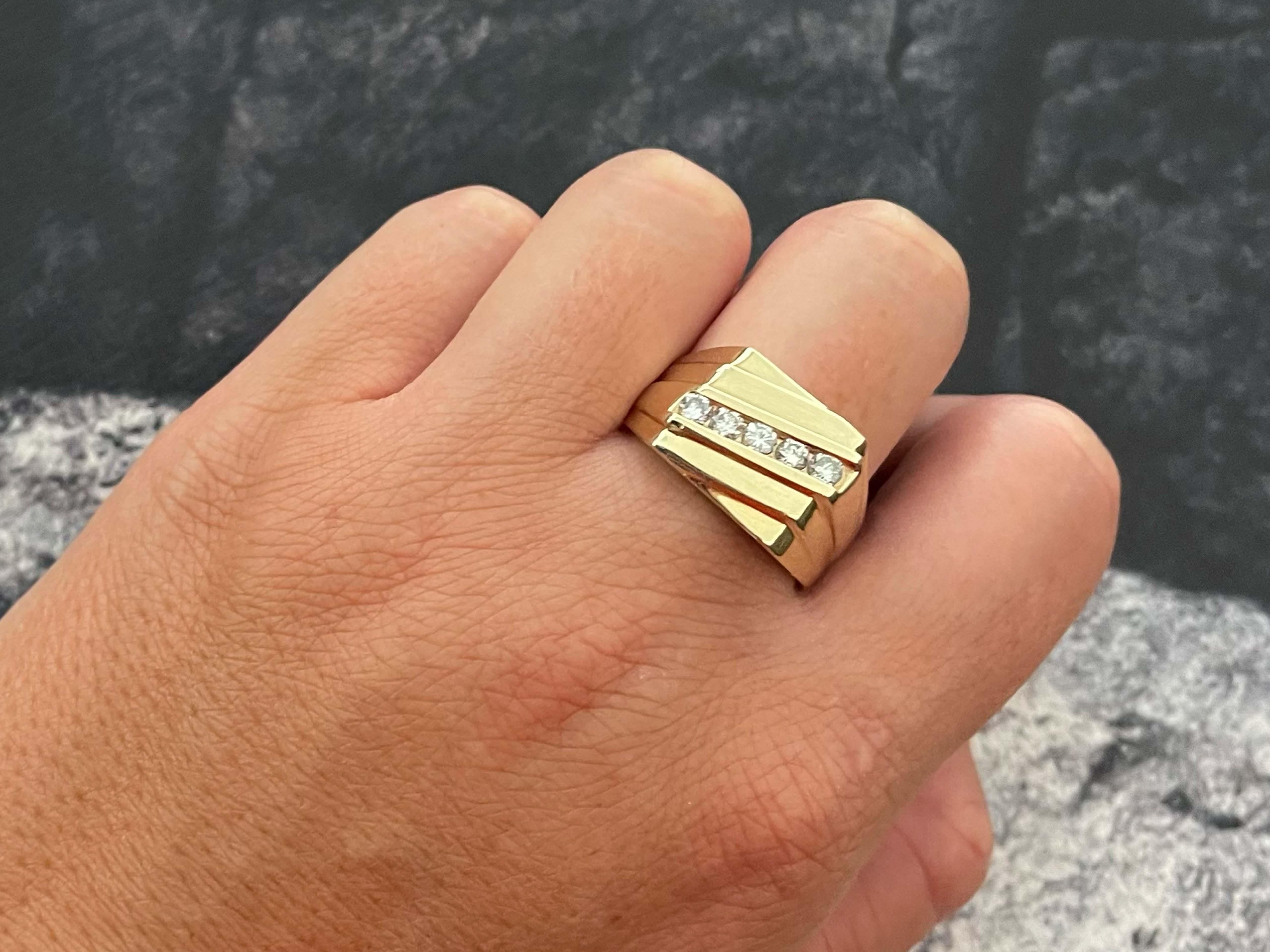 Item Specifications:

Metal: 14k Yellow Gold

Style: Statement Ring

Ring Size: 11.5 (resizing available for a fee)

Total Weight: 9.2 Grams

Gemstone Specifications: 5 brilliant cut diamonds

Diamond Carat Weight: 0.50 carats

Diamond Color: